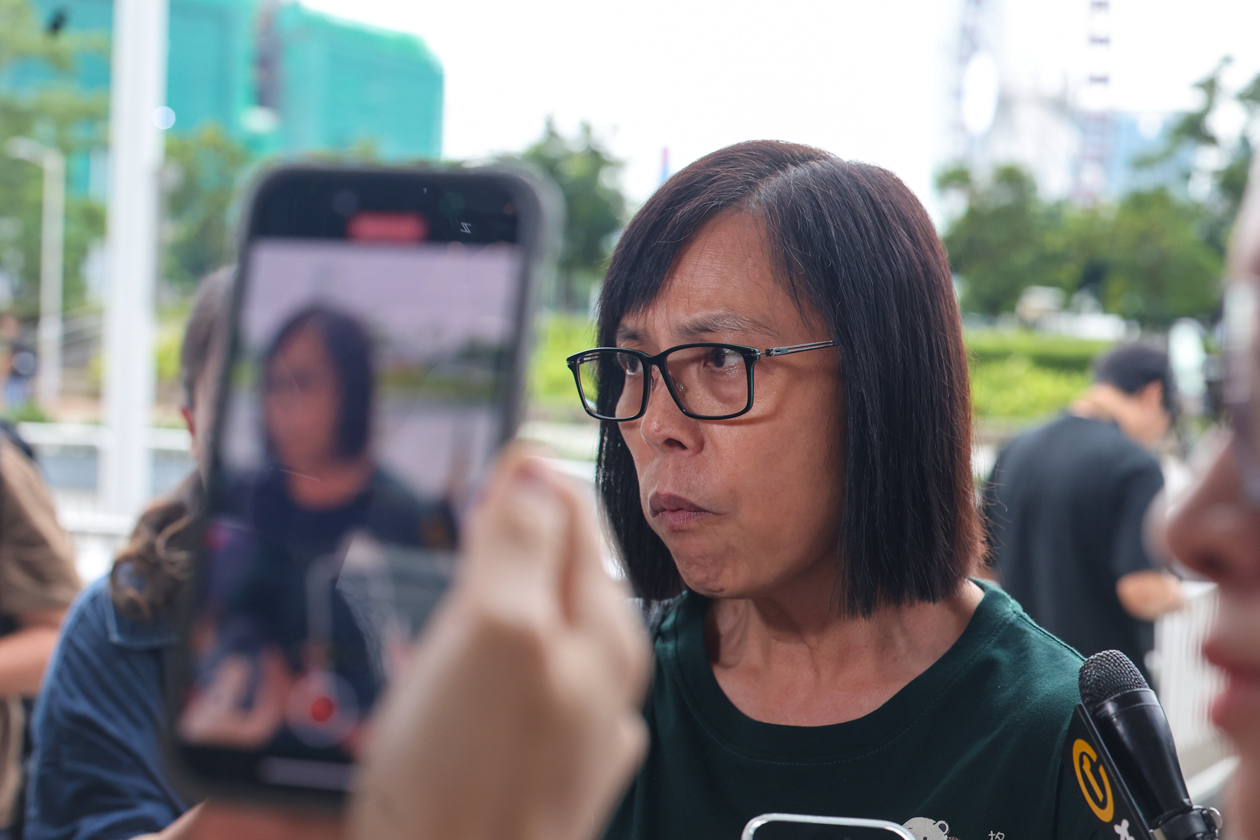 Miss Ho, resident of Wang Fuk Court, meets the media at City Gallery in Central after the Wang Fuk Court fire hearing. 16JUL26 SCMP / Edmond So