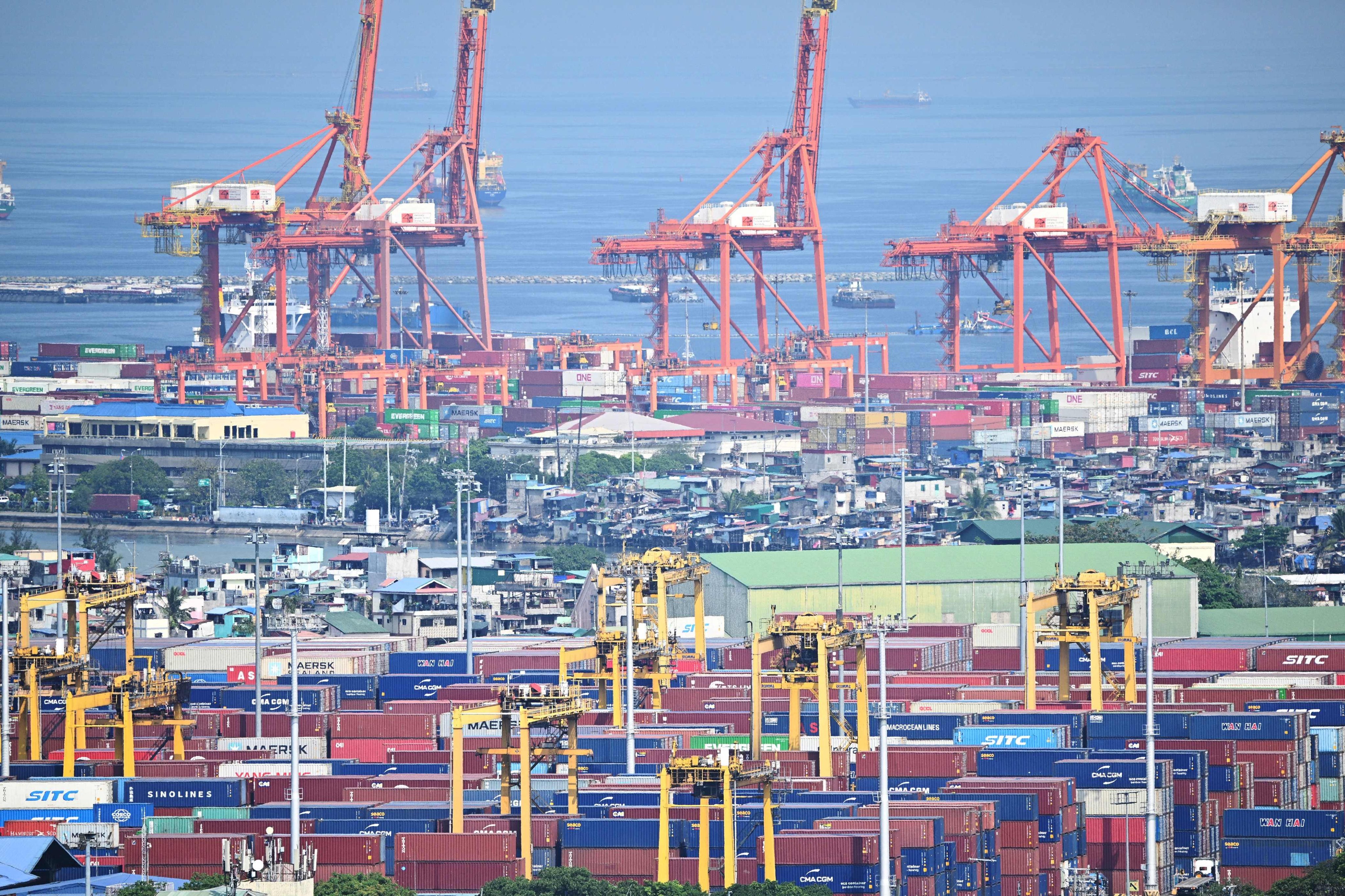 Containers and cranes at the international port of Manila last year. Risk analysts have praised the Philippines for its market openness, regulatory strength and labour rights. Photo: AFP