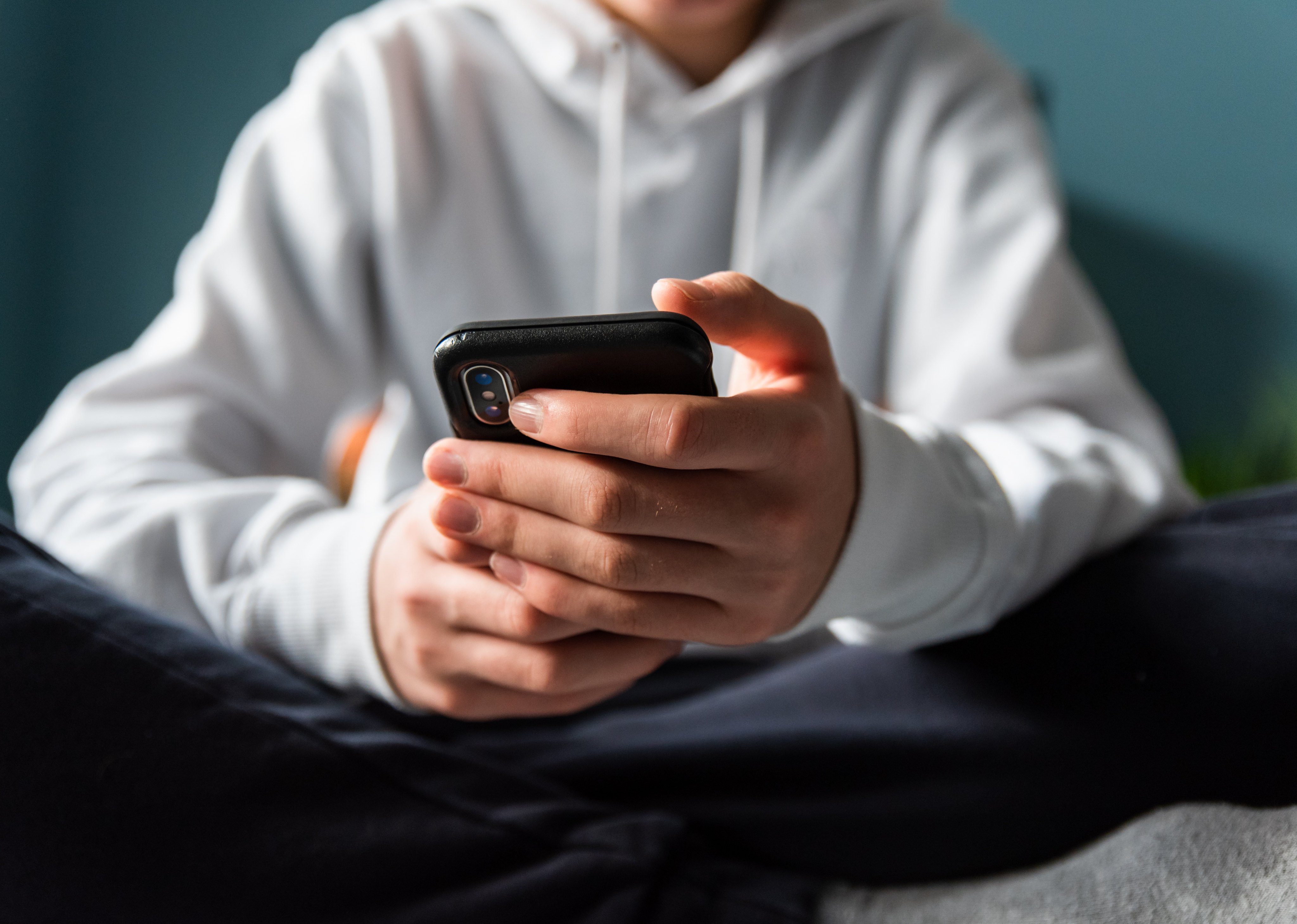 Texting and scrolling too much can hurt your thumbs, so make sure to switch up your posture. Photo: Getty Images