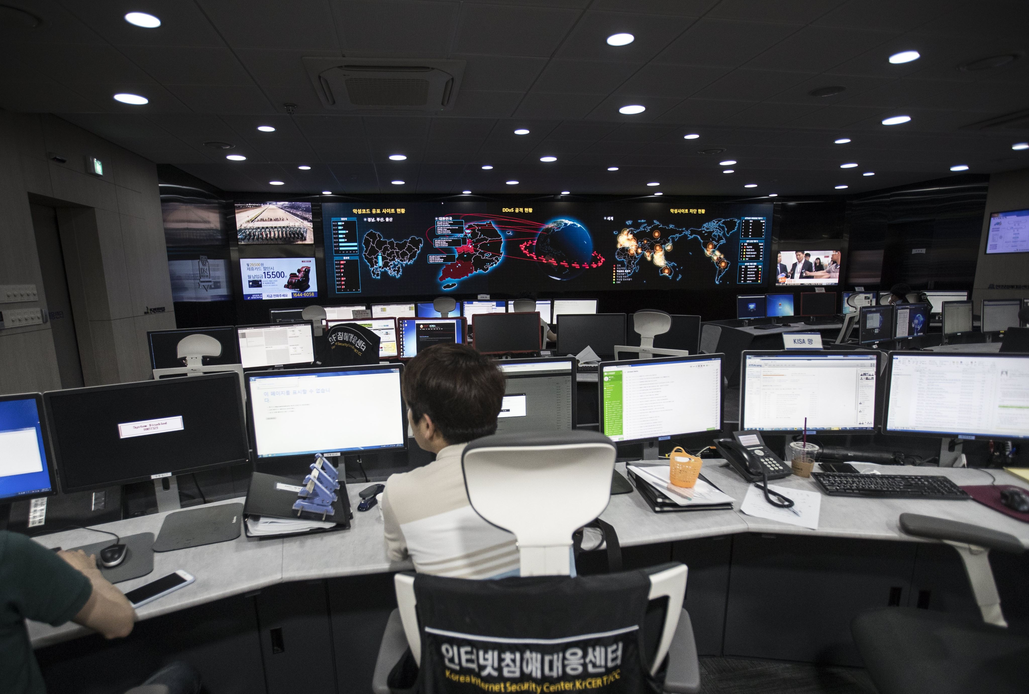 Officials at the Korea Internet & Security Agency (KISA) check internet systems at the KISA situation room amid reports that several computers were struck by a new type of ransomware the previous night, in Seoul, South Korea, on June 28, 2017. Photo: EPA
