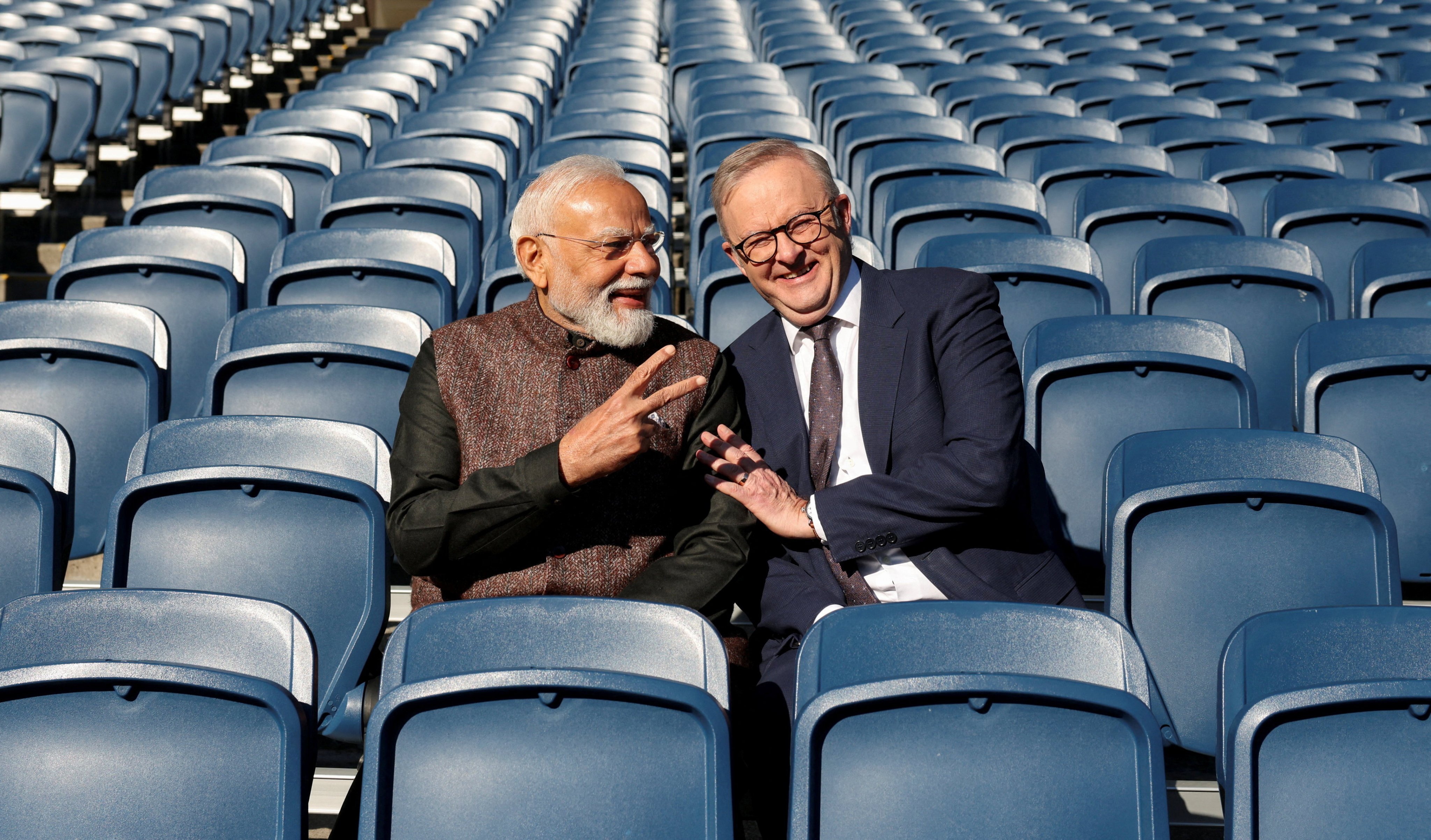 Indian Prime Minister Narendra Modi and his Australian counterpart Anthony Albanese pose for a picture in the stands at the Melbourne Cricket Ground on July 10. Photo: Reuters