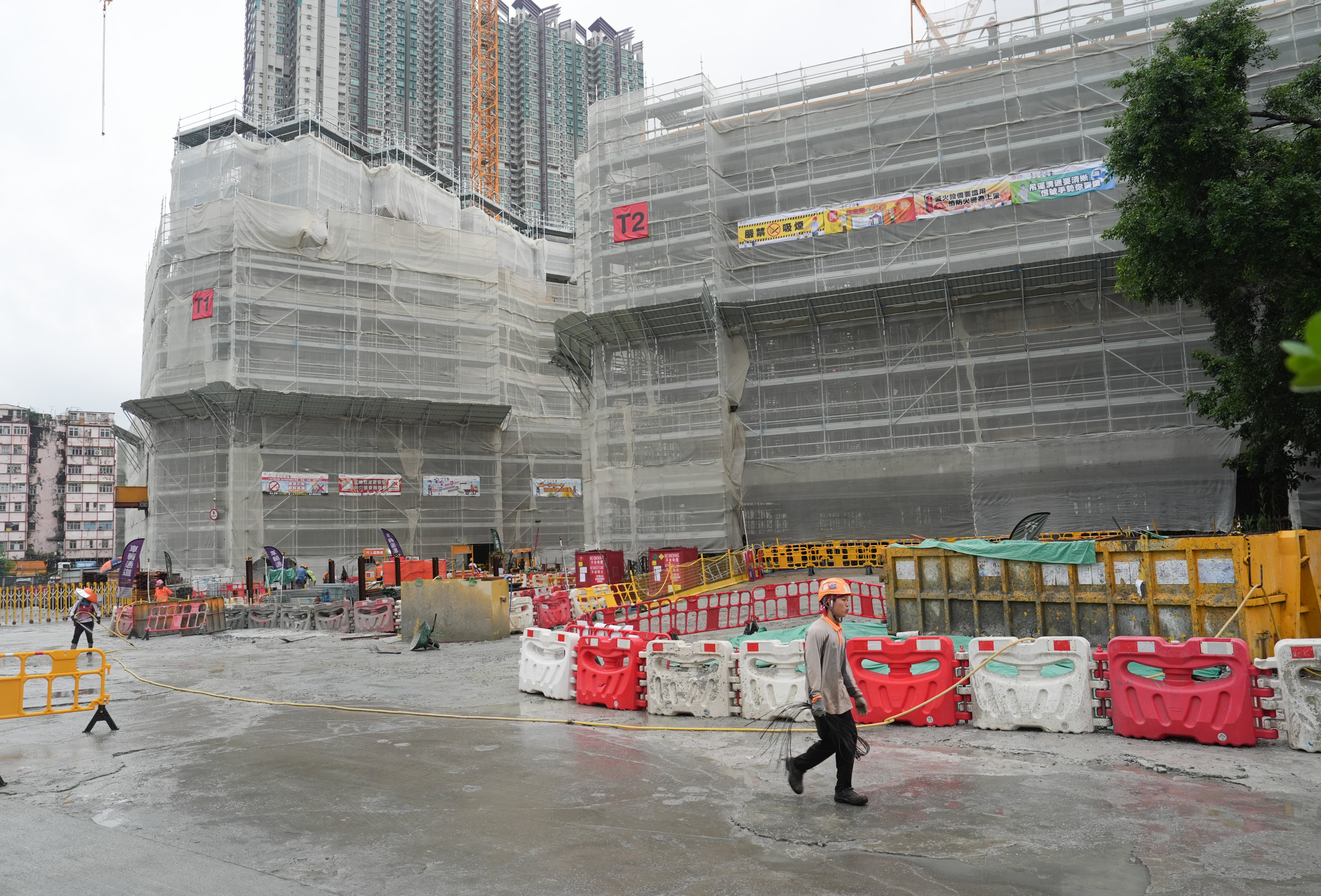 A construction site in To Kwa Wan. The smoking ban was introduced in the wake of the devastating fire at Wang Fuk Court last November. Photo: Elson Li