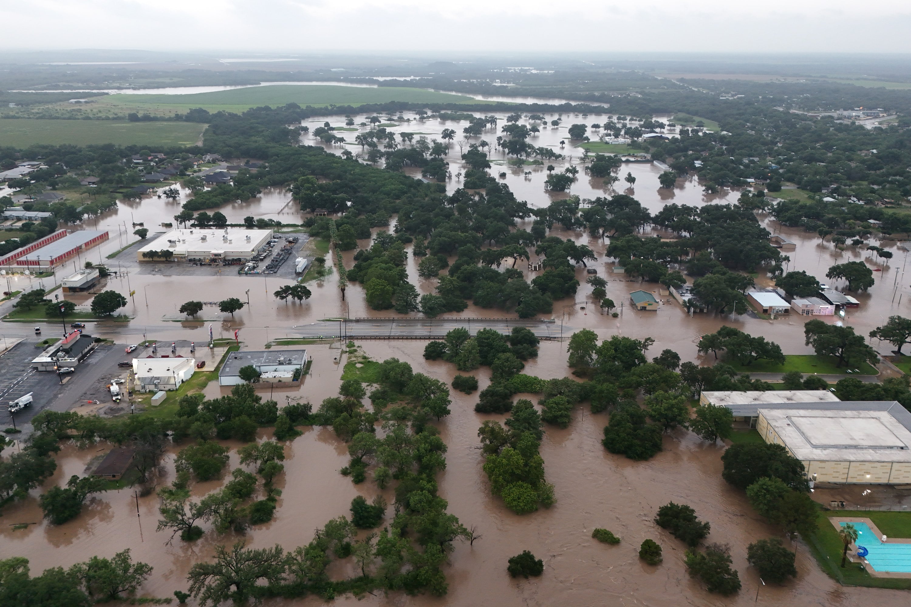 Floodwaters are seen in Uvalde, Texas, on Thursday. Photo: David Fry/Medina Real Estate Photography via AP