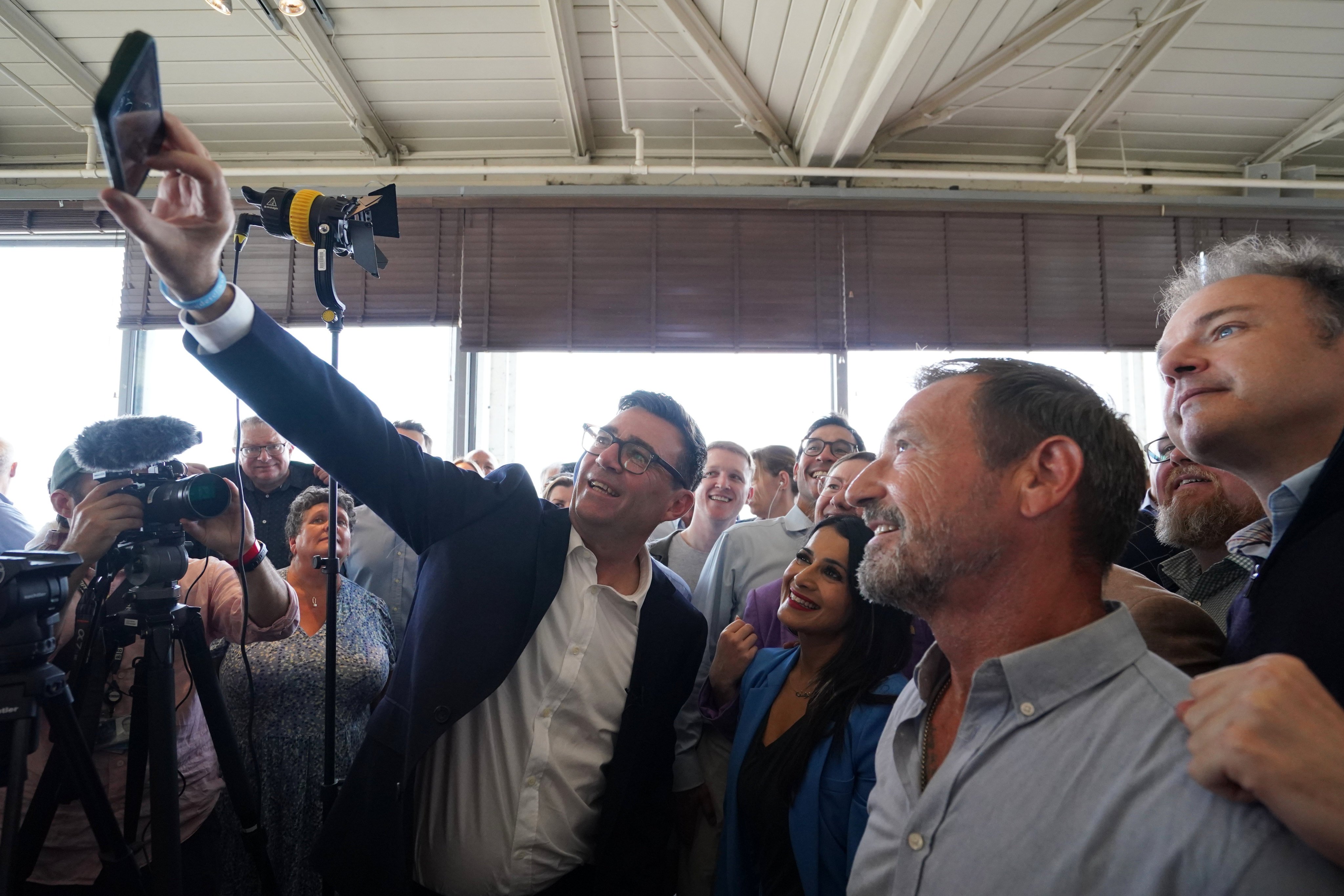 Newly confirmed Labour Party leader Andy Burnham takes a selfie with supporters in Gravesend, England, on Friday. Photo: PA via AP