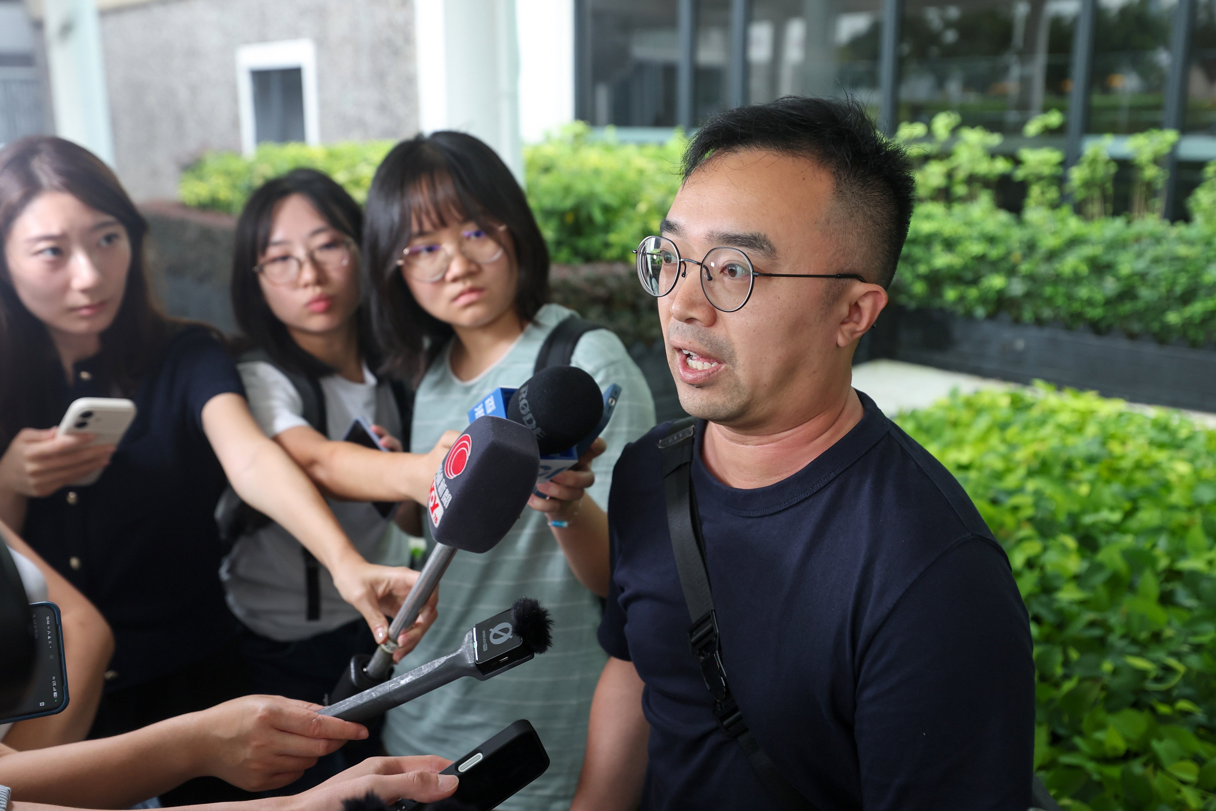 Patrick Liu, a Wang Shing House resident, speaks to the media after the last session of the independent committee’s hearings on Friday. Photo: Edmond So