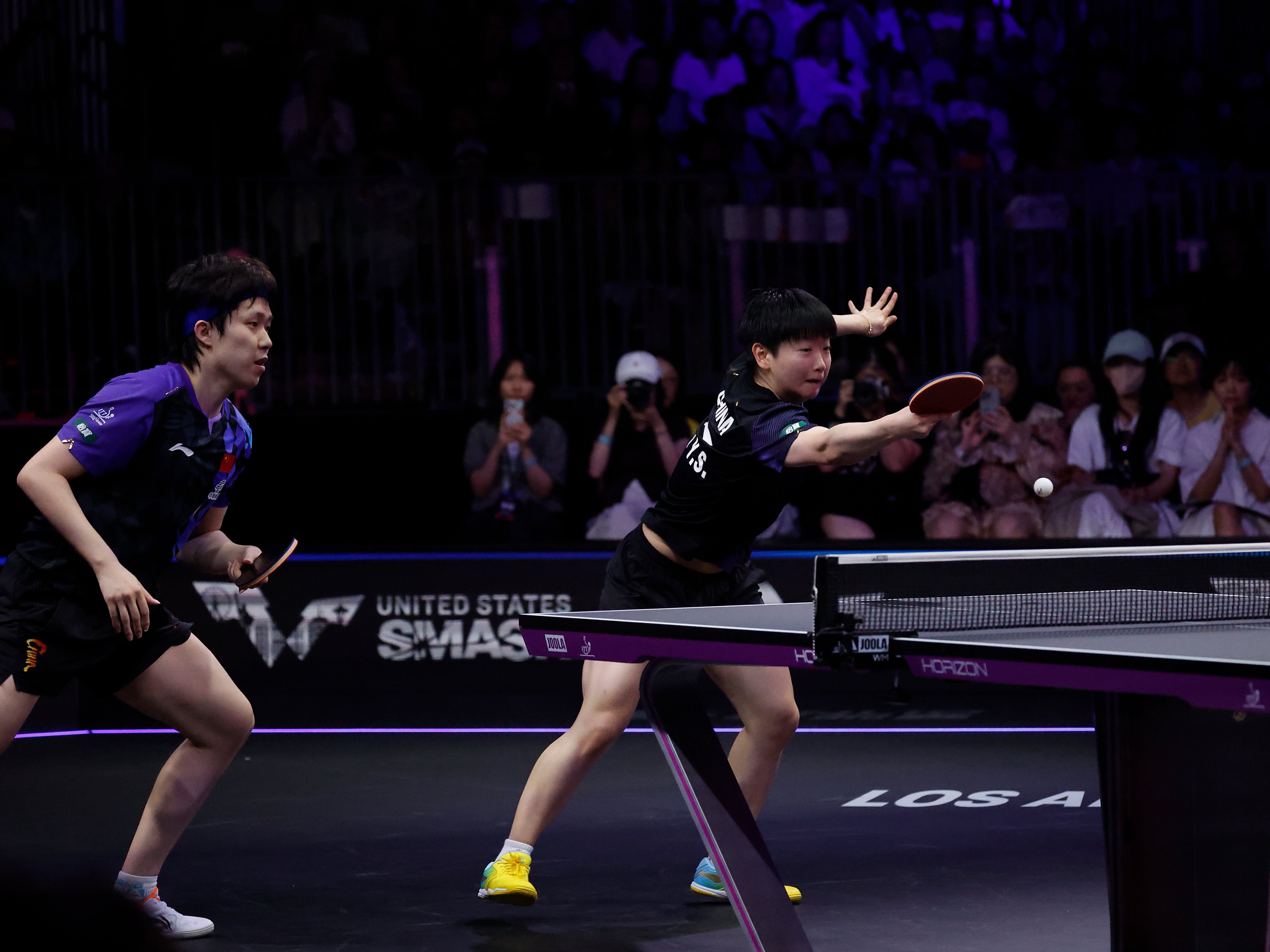 The mixed doubles form of Wang Chuqin (left) and Sun Yingsha has sparked concern among fans. Photo: Xinhua