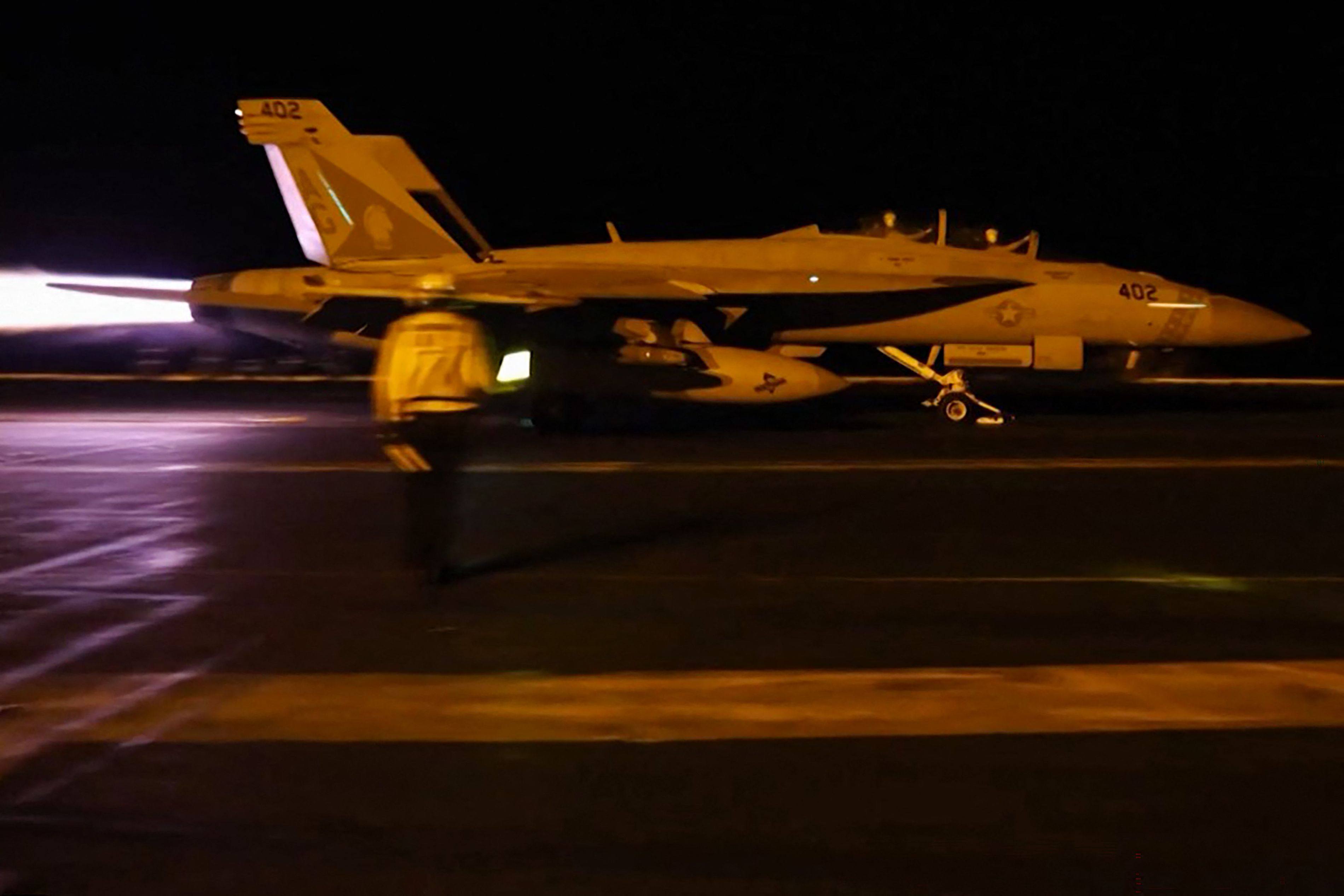 A US fighter jet takes off to launch what the military says are precision strikes targeting Iranian military capabilities on Saturday. Photo: CENTCOM/AFP