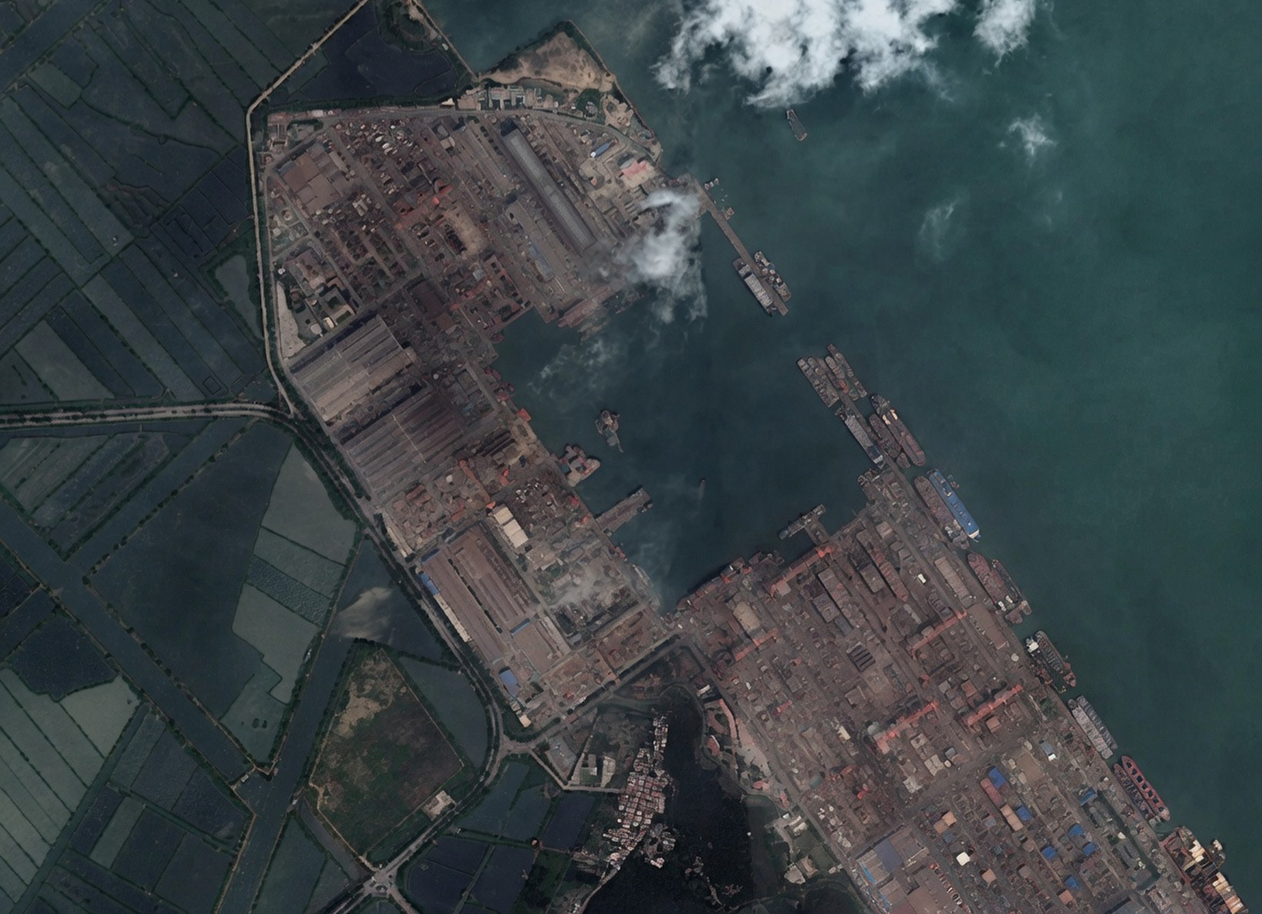 Analysts are examining satellite imagery of China’s Comec Longxue shipyard near Guangzhou for insight into how China’s navy plans to operate. Photo: Google Earth