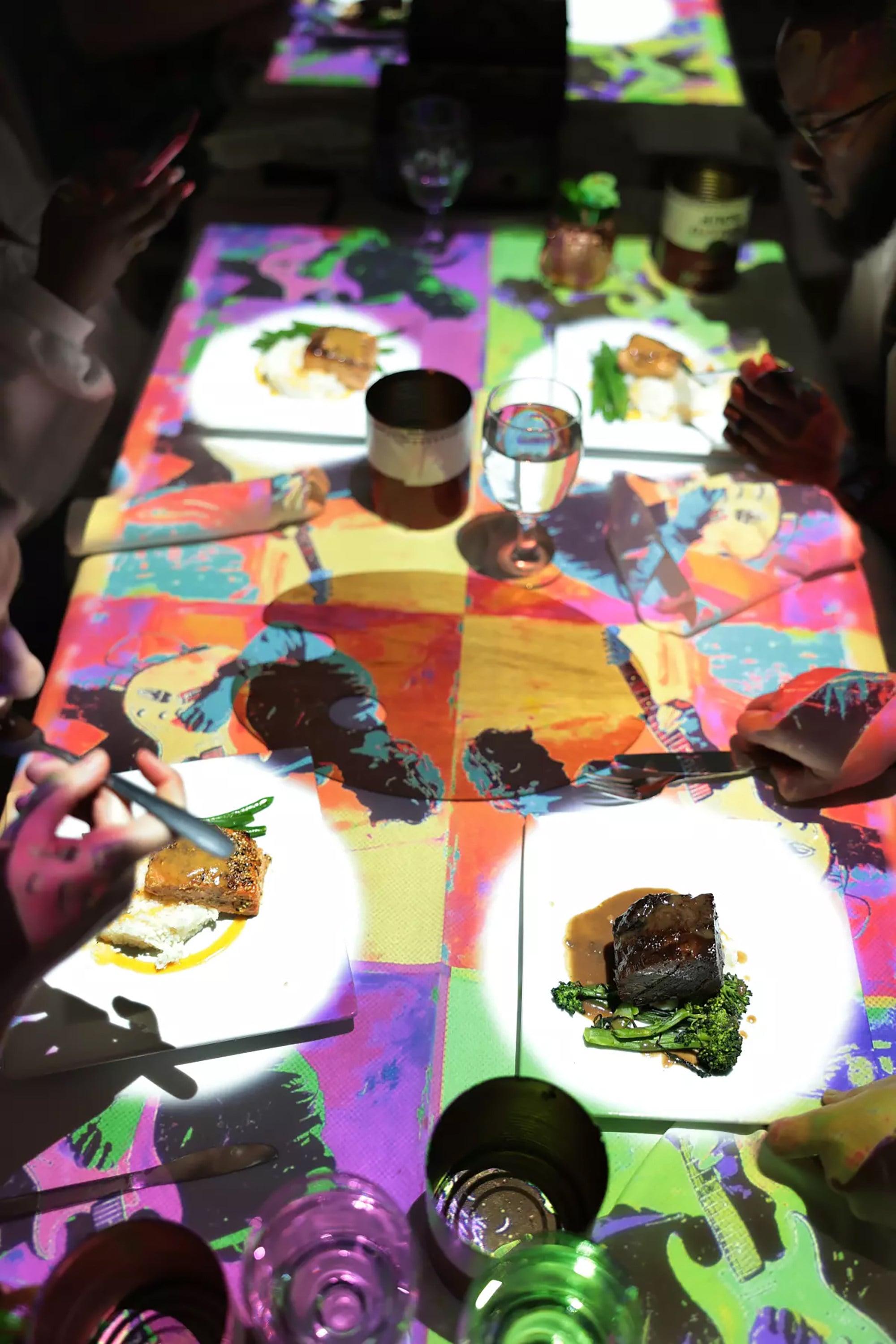 Projections fill up the dining table during meals. (Christina House/Los Angeles Times/TNS)