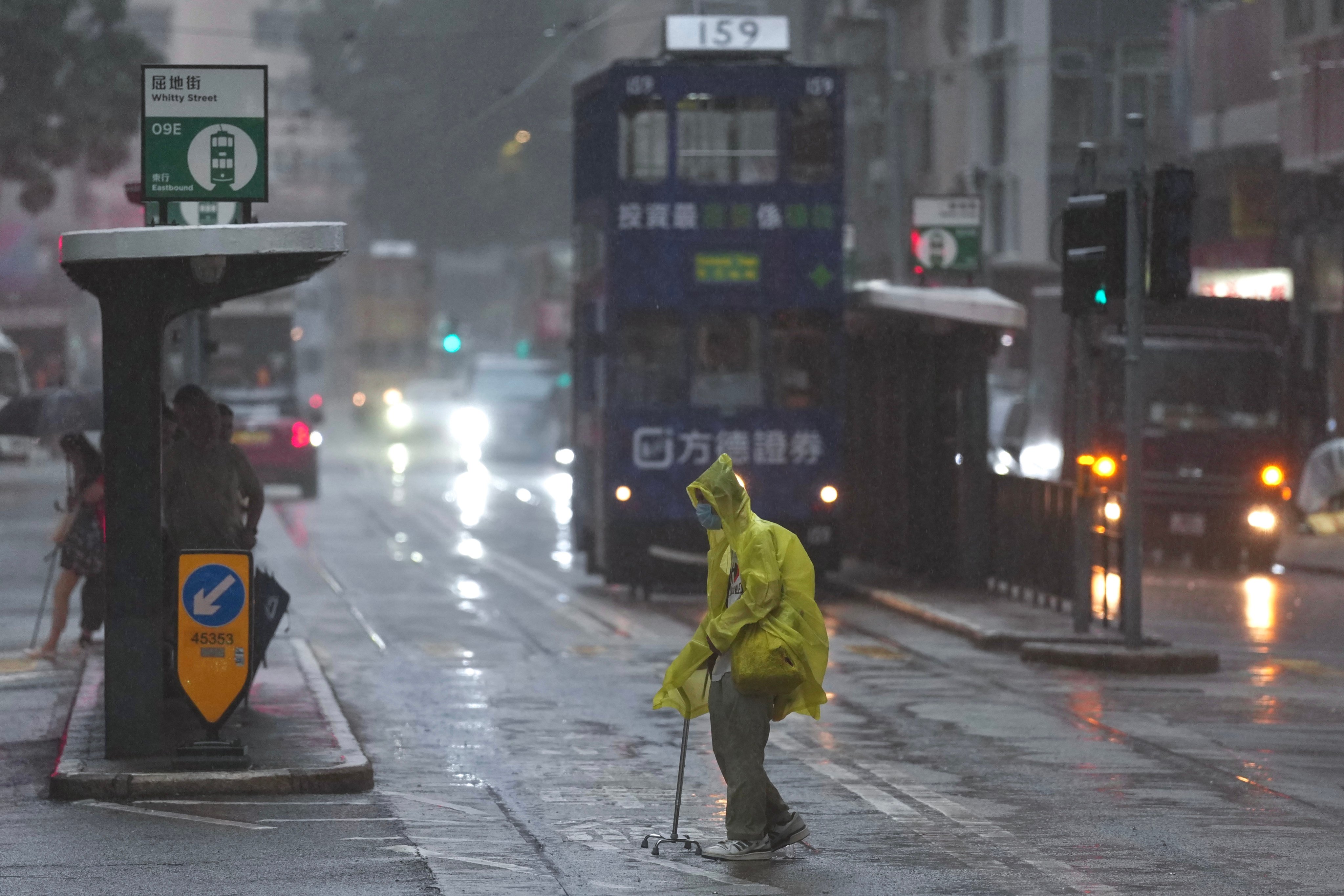 Hong Kong’s red rainstorm warning downgraded to amber, but unsettled weather persists. Photo: Karma Lo