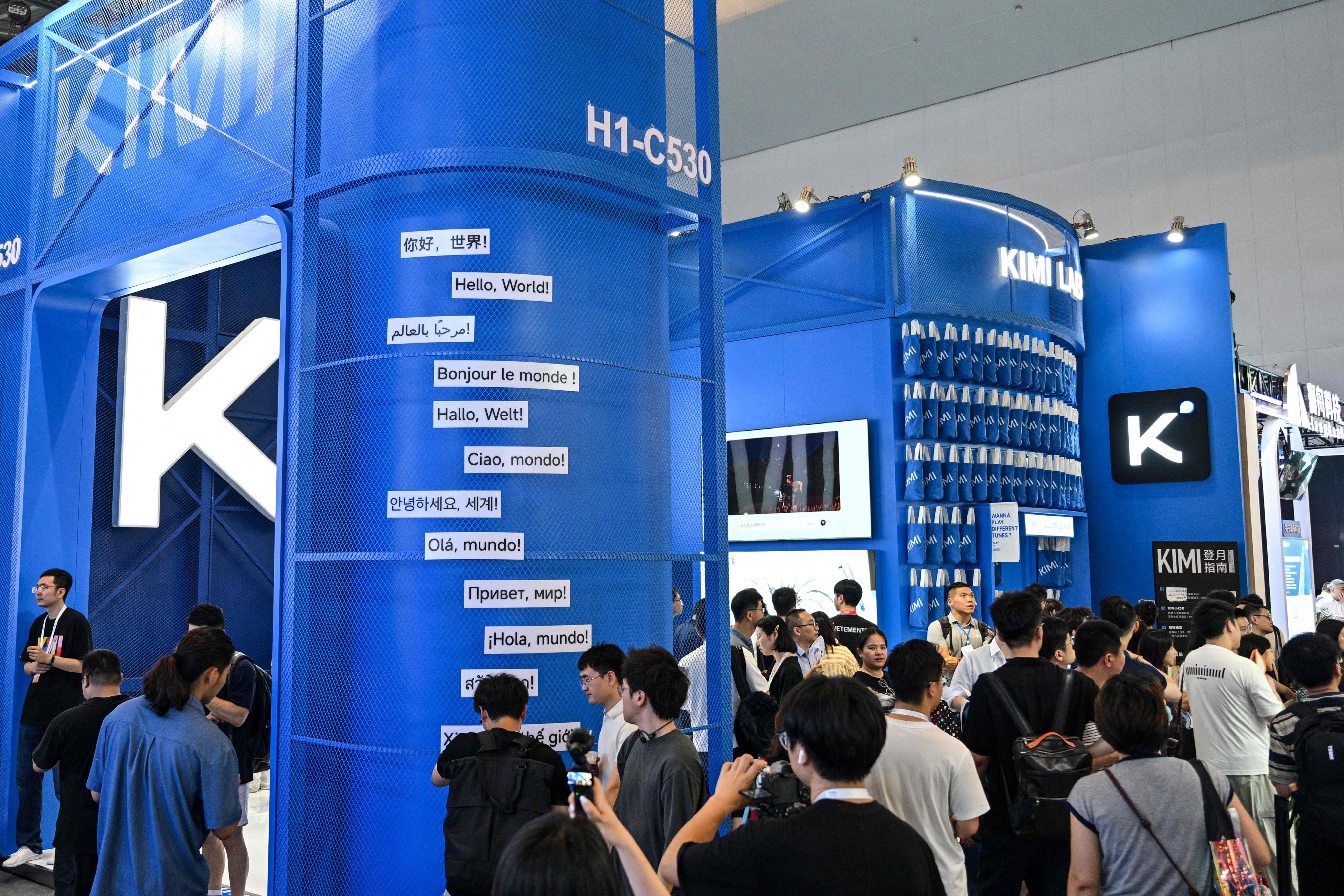 People visit the Moonshot AI stand, featuring the Kimi K3 model, during the World Artificial Intelligence Conference in Shanghai on July 18. Photo: AFP