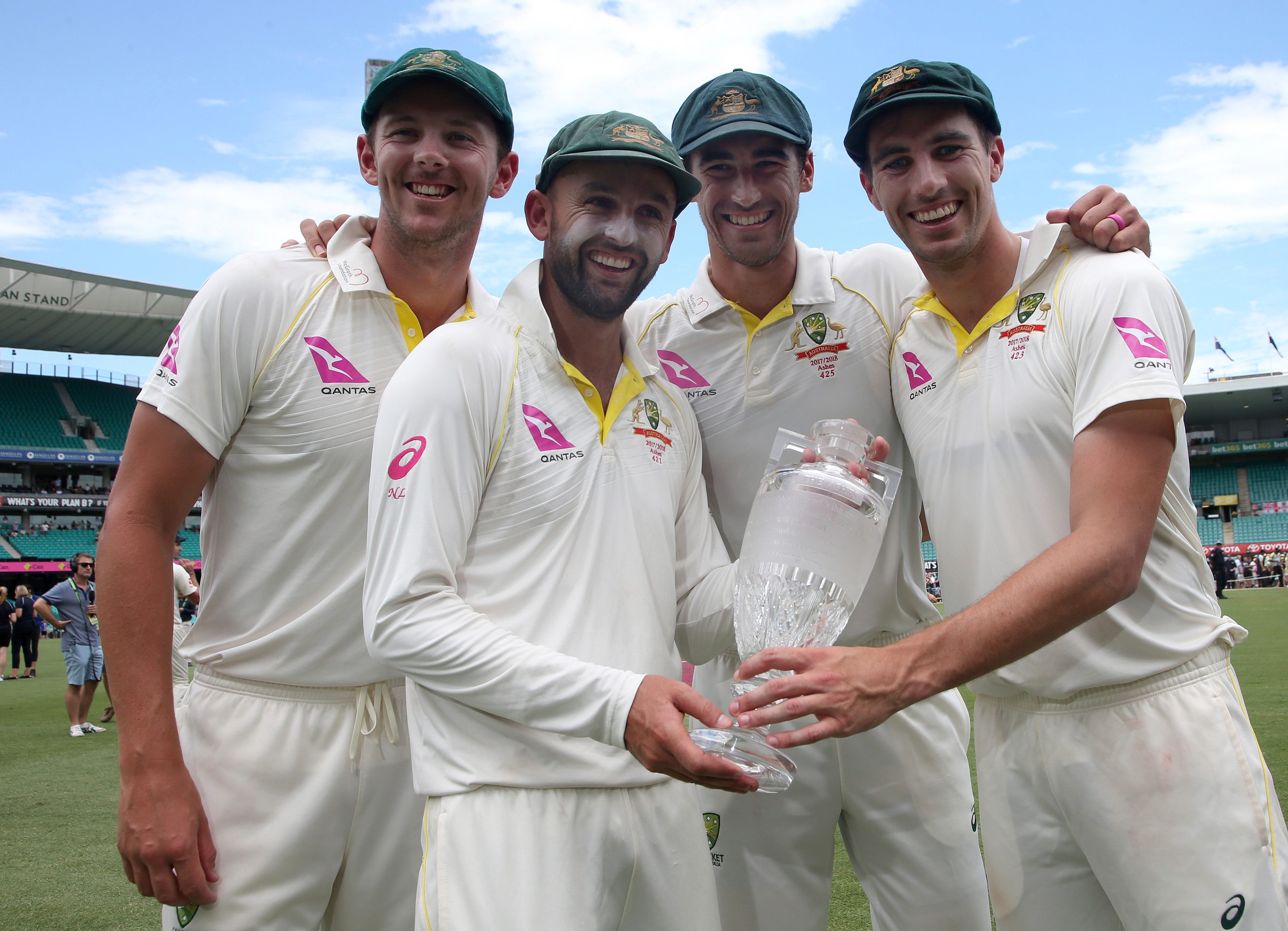 Australian bowlers (from left) Josh Hazlewood, Nathan Lyon, Mitchell Starc and Pat Cummins, here holding the Ashes trophy after their 2018 win, have all been selected to face Bangladesh. Photo: AP