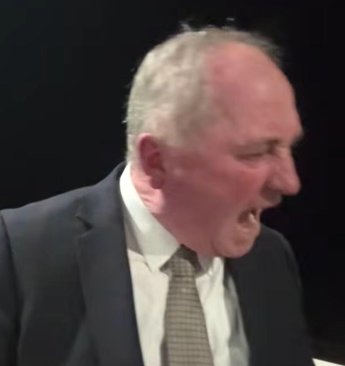 Barnaby Joyce yells at his dog while being interviewed on ABC on Monday night. Photo: ABC