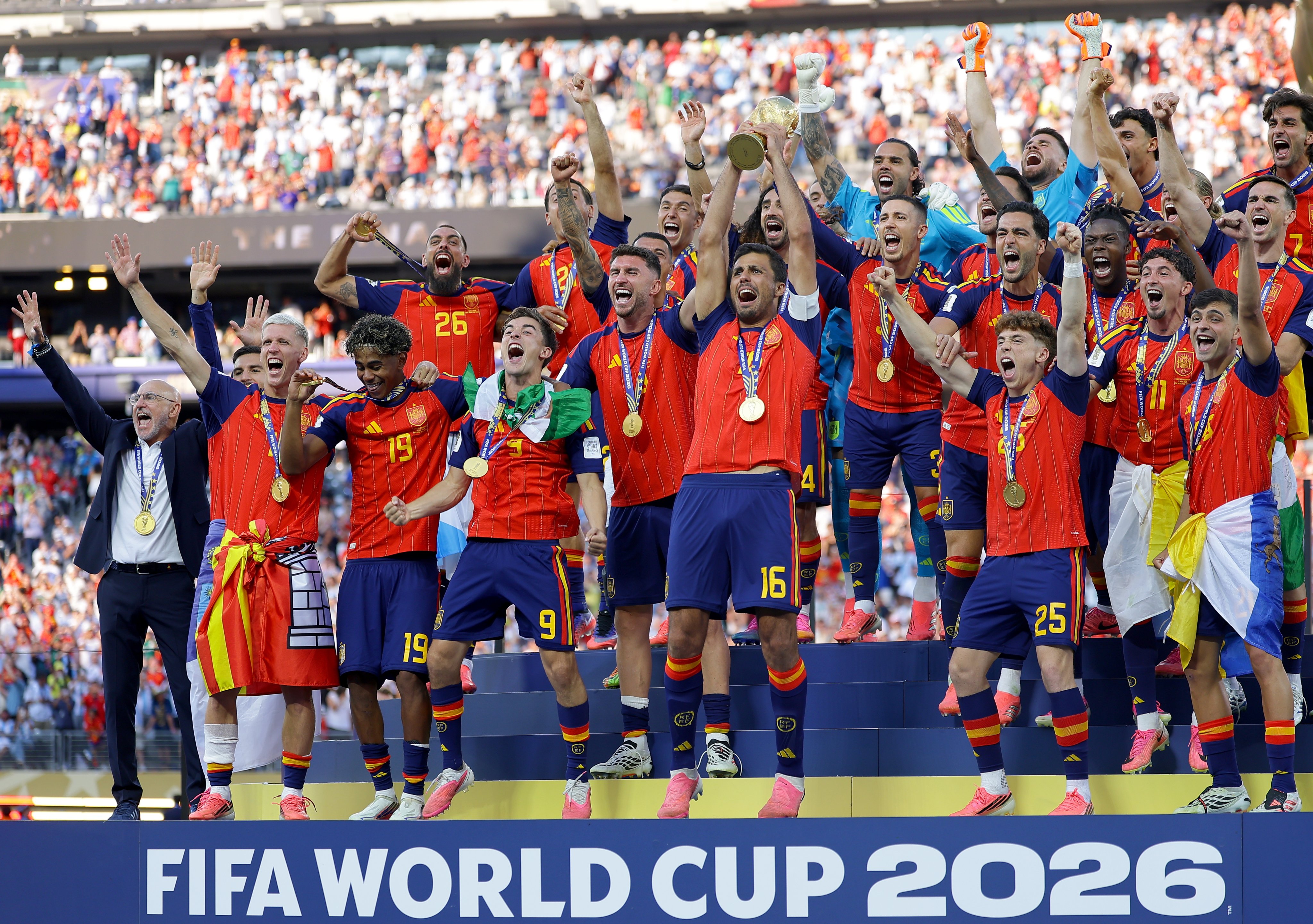 The Spanish team celebrates victory against Argentina. Photo: EPA