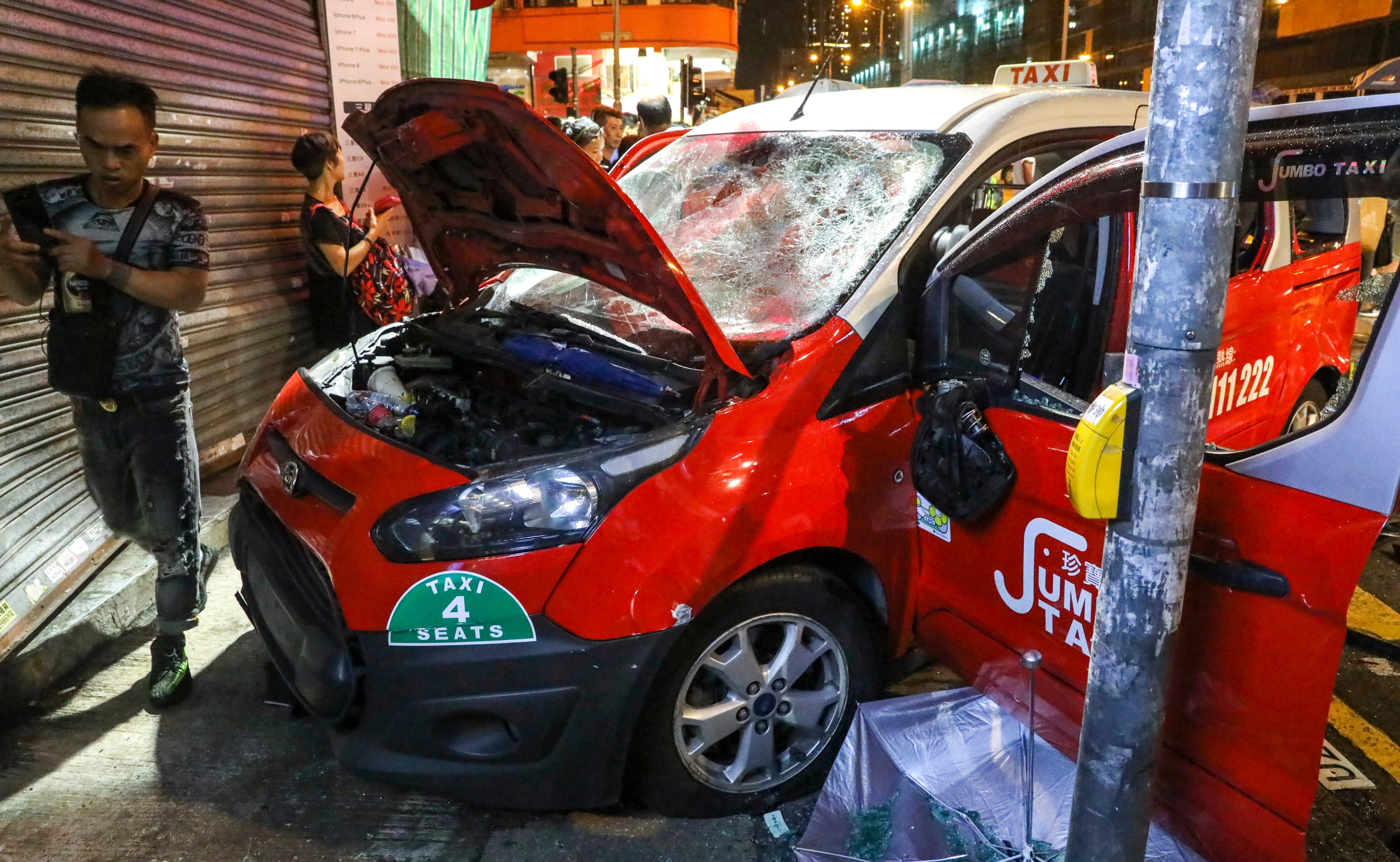 The taxi mounted a pavement and struck Park Hoi-lam during an anti-government protest in Sham Shui Po on October 6, 2019. Photo:  K.Y. Cheng