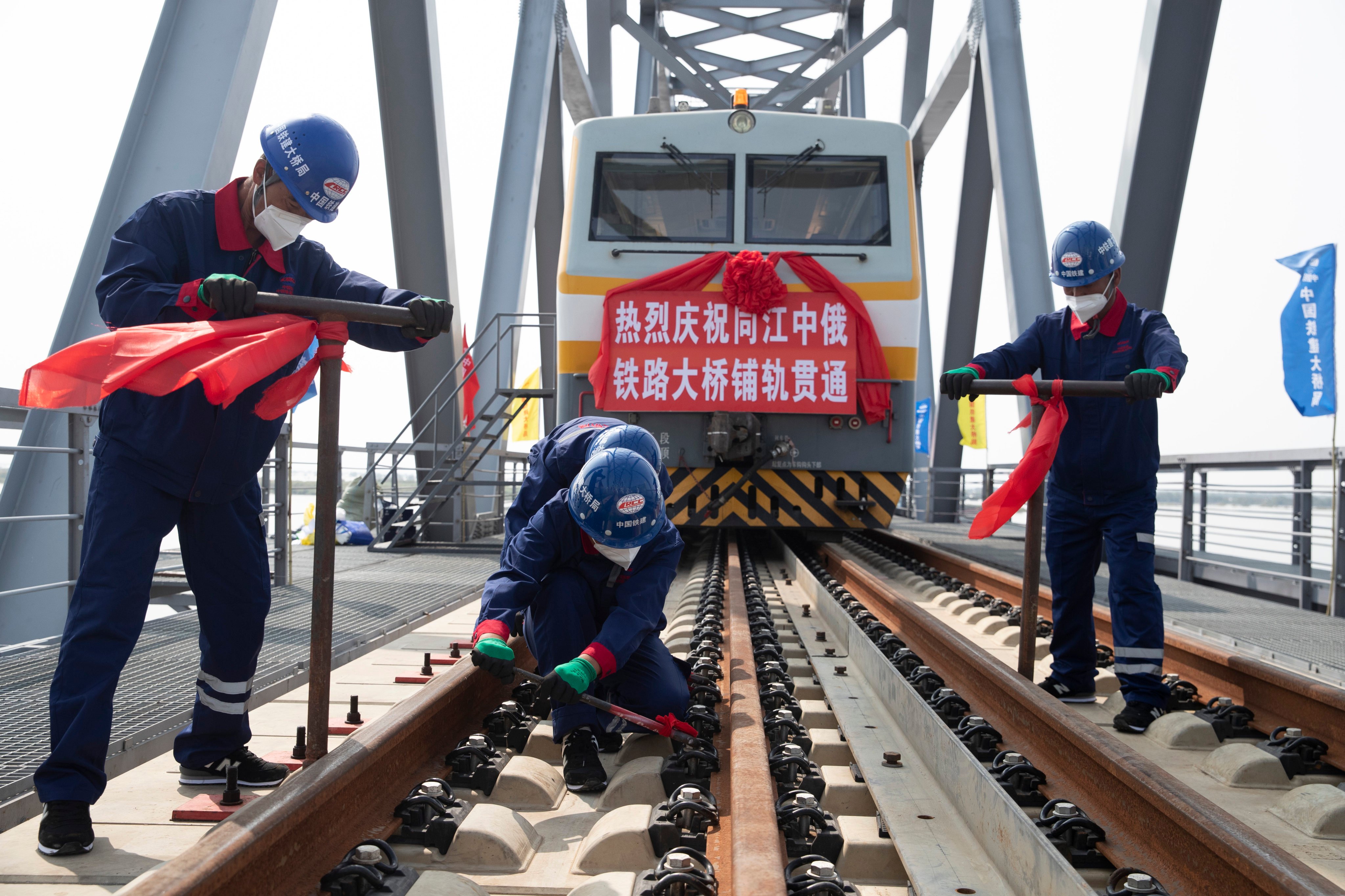 A railway bridge between China’s Tongjiang and Russia’s Nizhneleninskoye is seen under construction in 2021, before opening in 2022. Photo: Xinhua