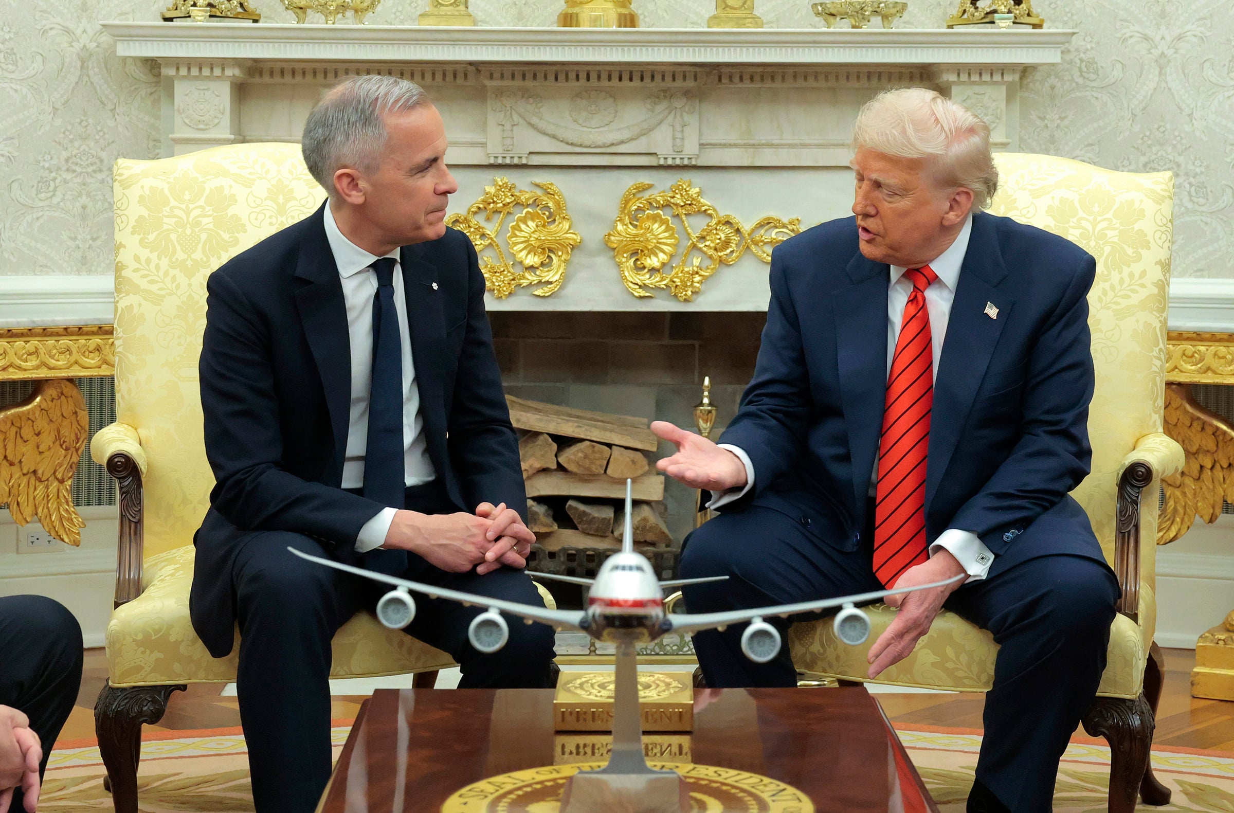 US President Donald Trump, right, and Canadian Prime Minister Mark Carney in the Oval Office at the White House in Washington. Photo: Getty Images / TNS