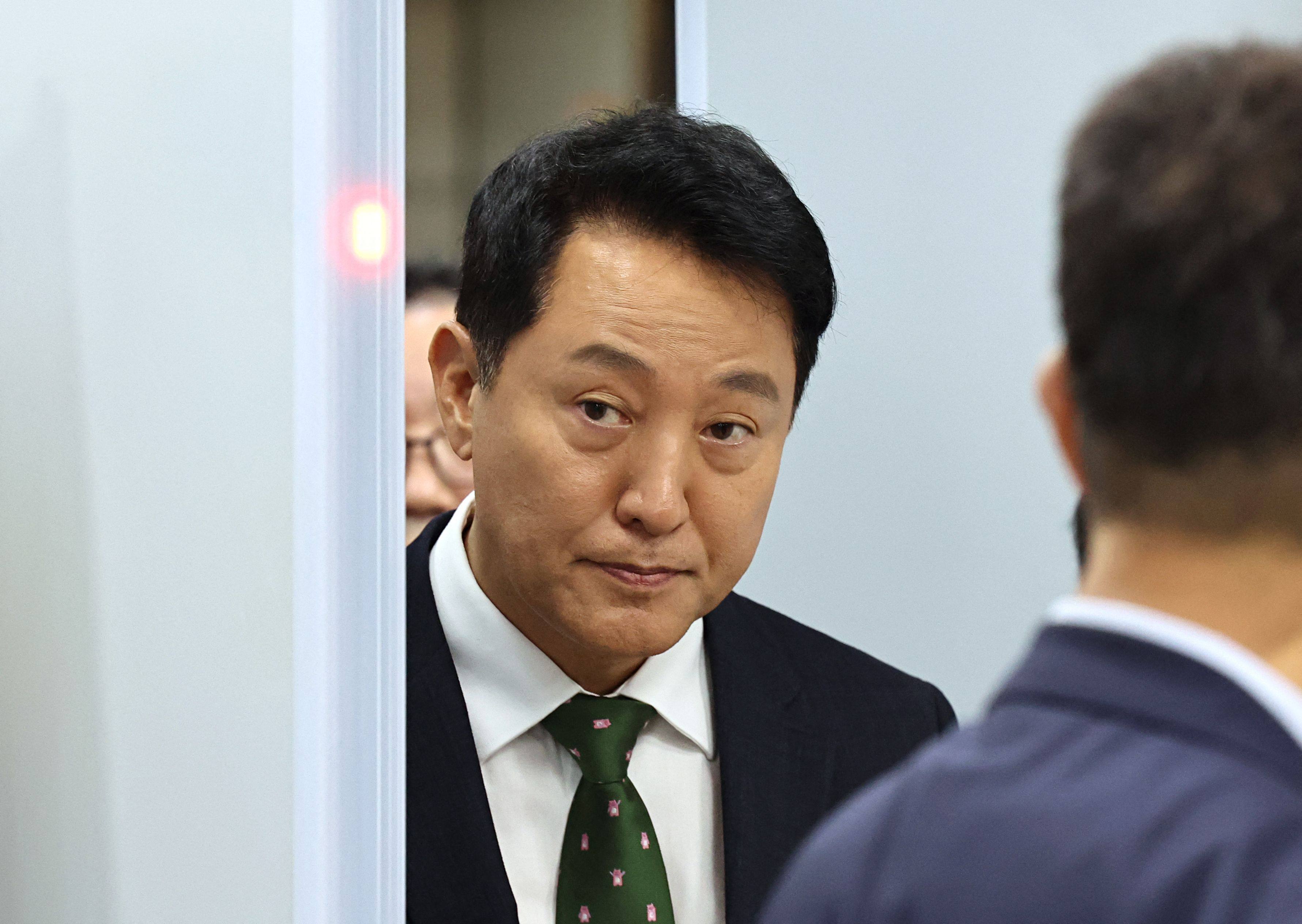 Seoul Mayor Oh Se-hoon leaves court after his trial on Wednesday. Photo: Yonhap/AFP
