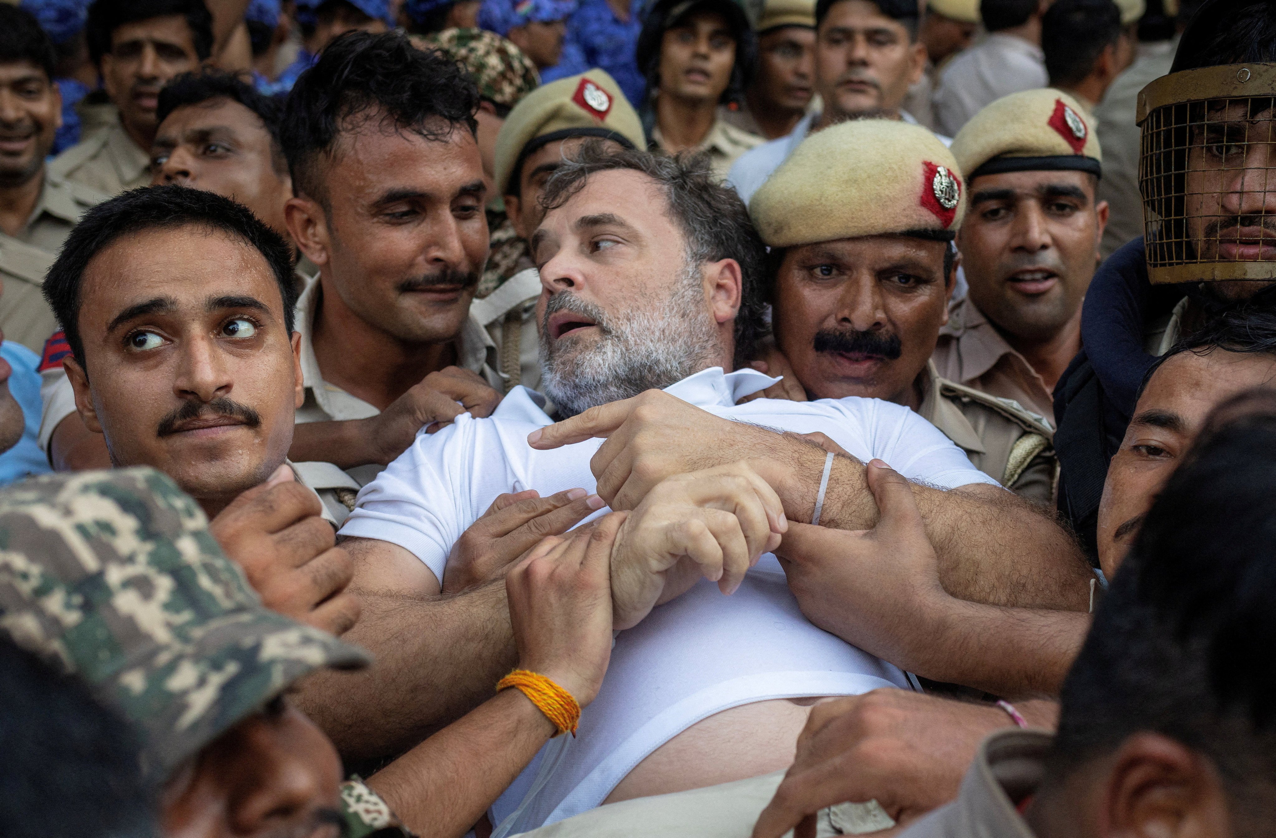 Indian opposition leader Rahul Gandhi is detained by police during a sit-in protest outside Prime Minister Narendra Modi’s residence, demanding accountability for police action against students, in New Delhi on Tuesday. Photo: Reuters