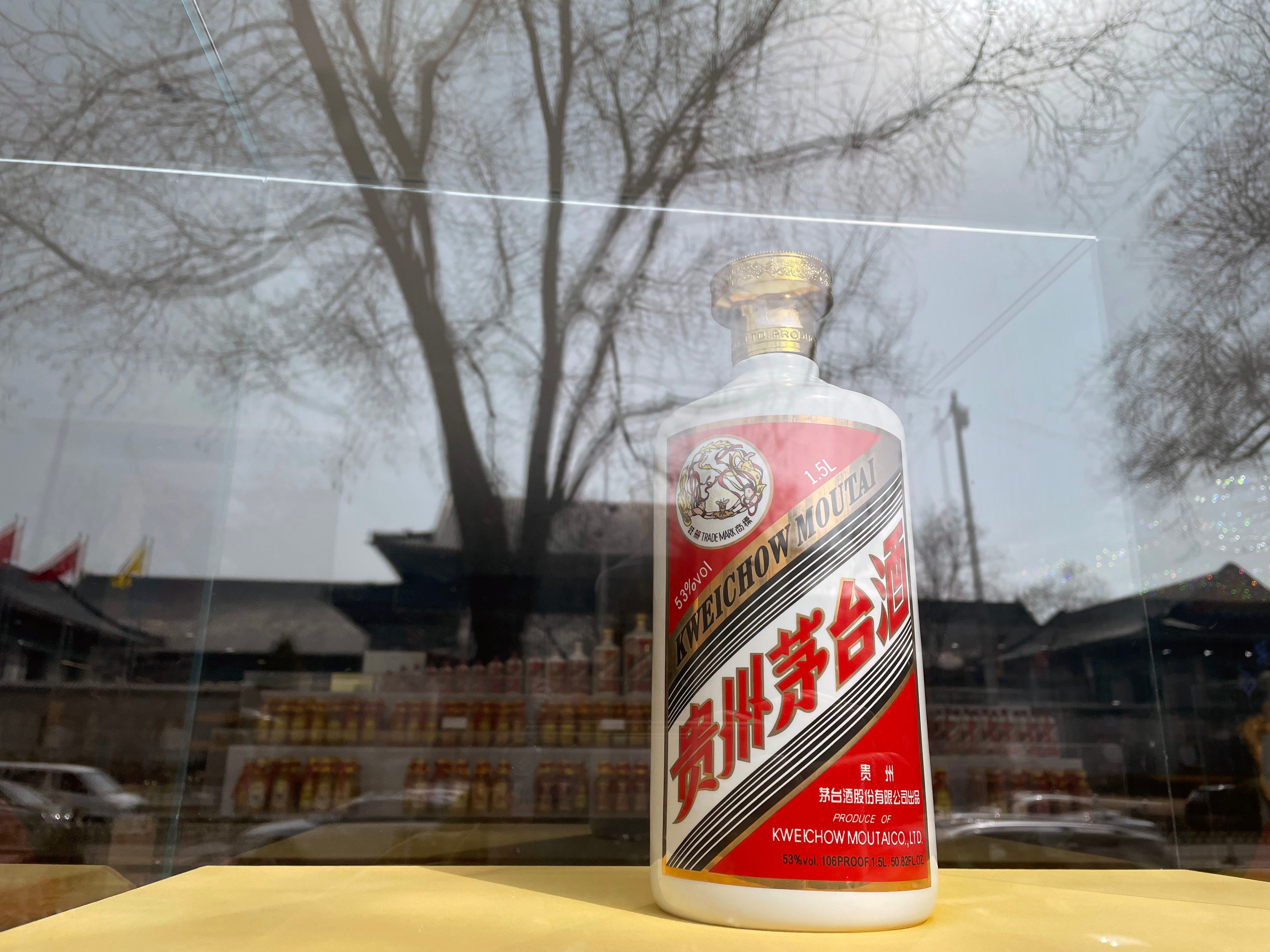 A bottle of Mao-tai, a variety of baijiu, is displayed in the window of a shop in Beijing on March 15, 2022. Photo: Simon Song