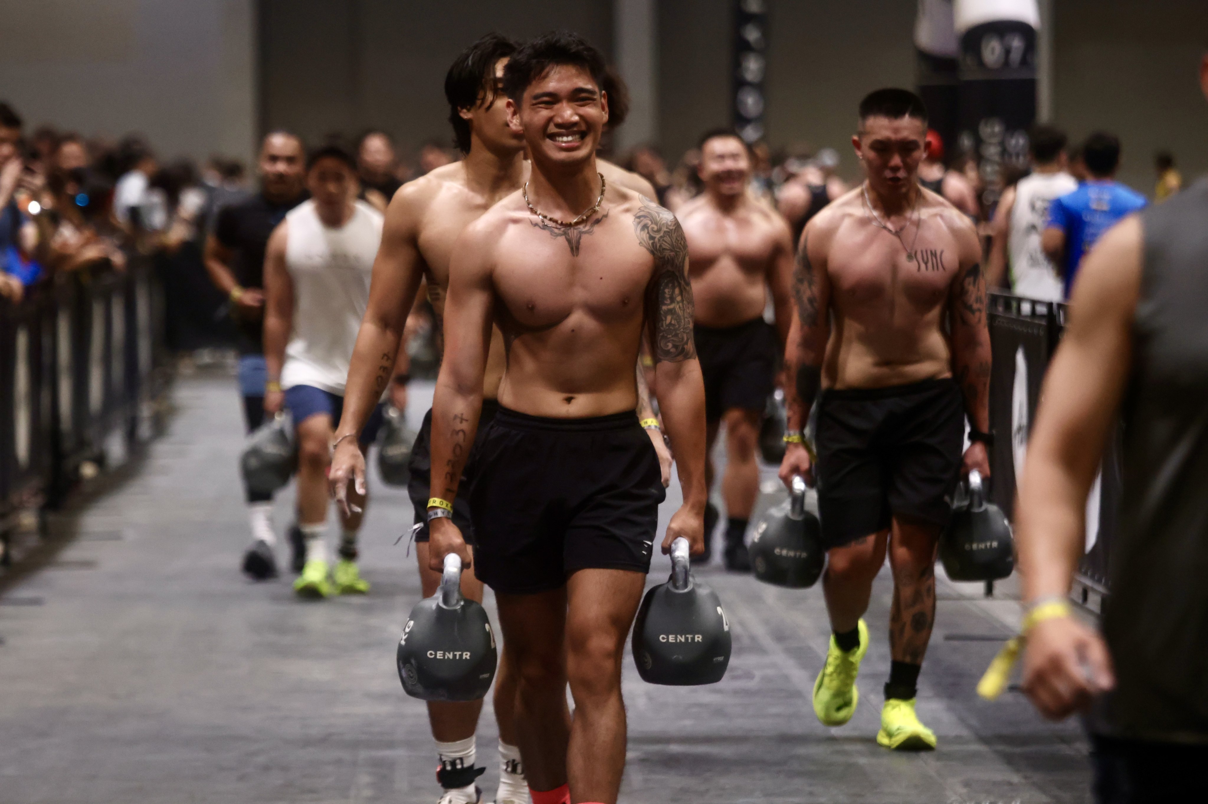 People take part in Hyrox Hong Kong 2026 at AsiaWorld-Expo on May 8, 2026. Hyrox attracts people of all ages, but jumping into the activity too quickly - especially for those in mid-life - can cause problems. Photo: Jonathan Wong