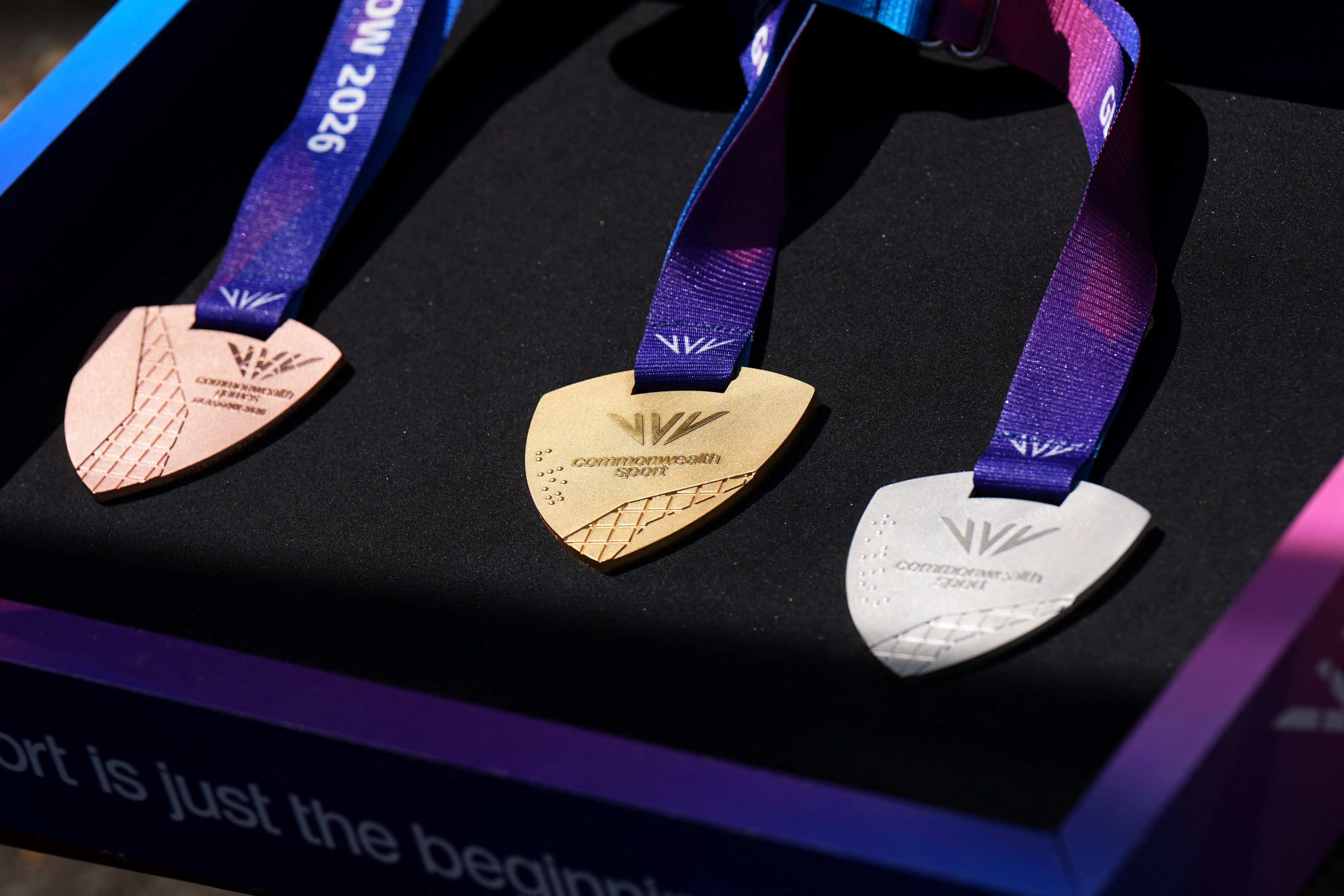 Examples of the medals that will be presented to athletes at the Commonwealth Games. Photo: Reuters