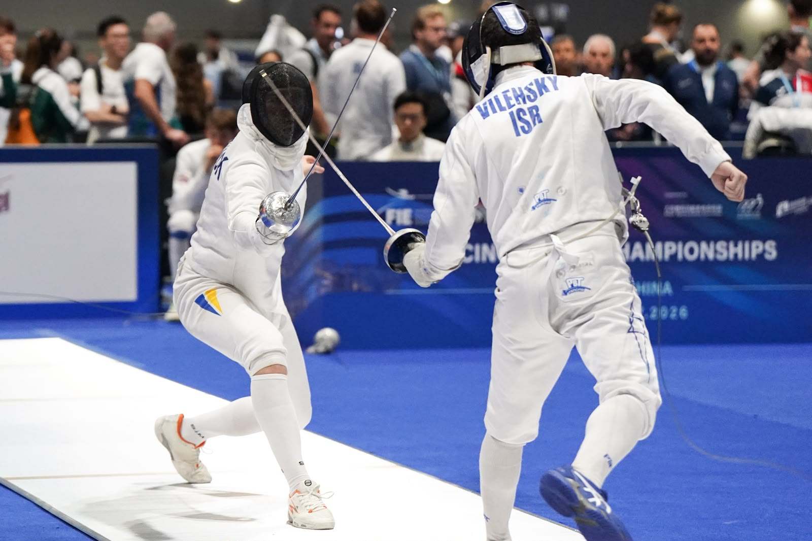 Ukraine’s Mykhailo Krasniuk (left) takes on Israel’s Dov Vilensky at the AsiaWorld-Expo. Photo: Mike Chan