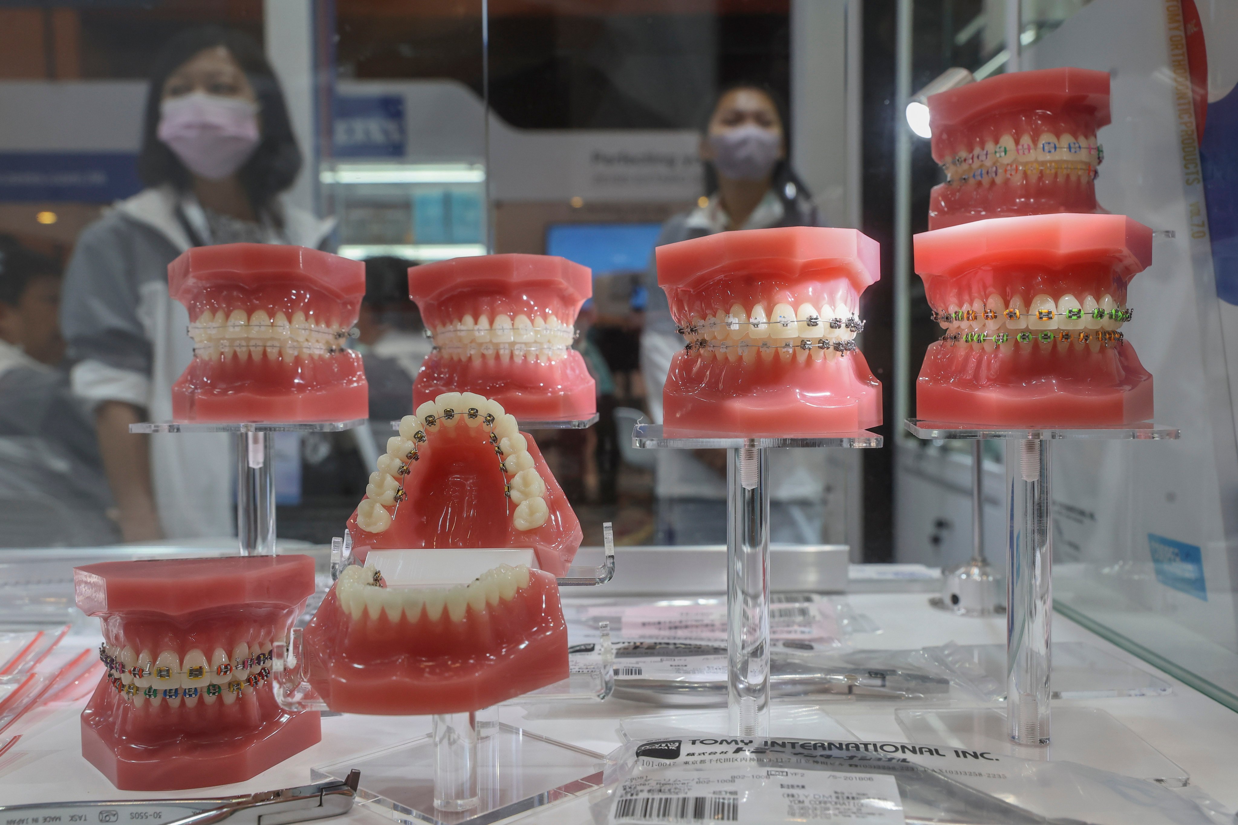Models of gums and teeth at a Hong Kong dental expo. The Health Bureau and the Department of Health said they were following up on reports about booths run by mainland Chinese dental clincs in the city. Photo: Edmond So