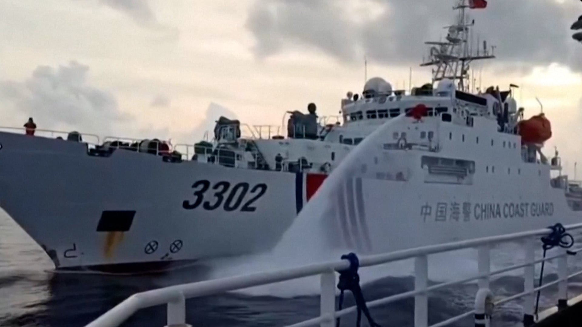 Philippines accuses China of firing a water cannon at its vessels for a second day