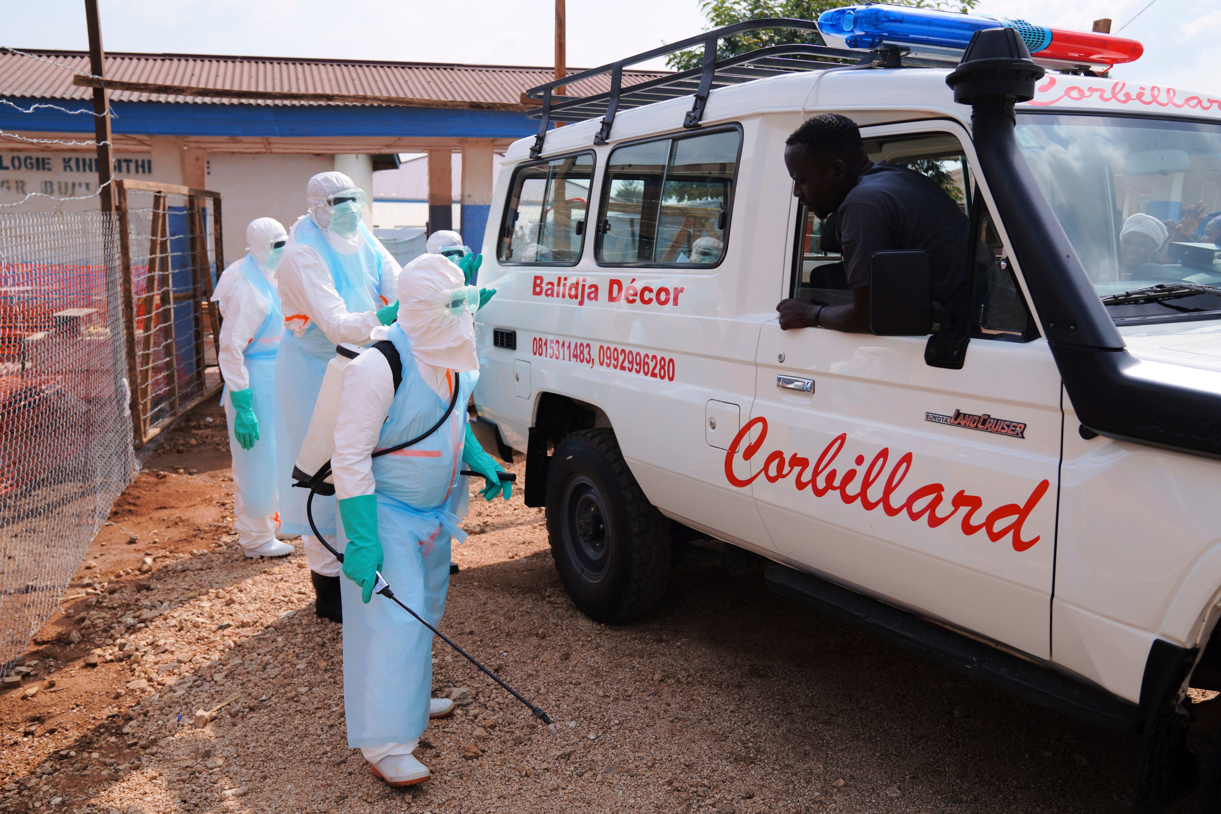 Health workers disinfect an ambulance in Ituri, Congo, on Wednesday. Photo: AP