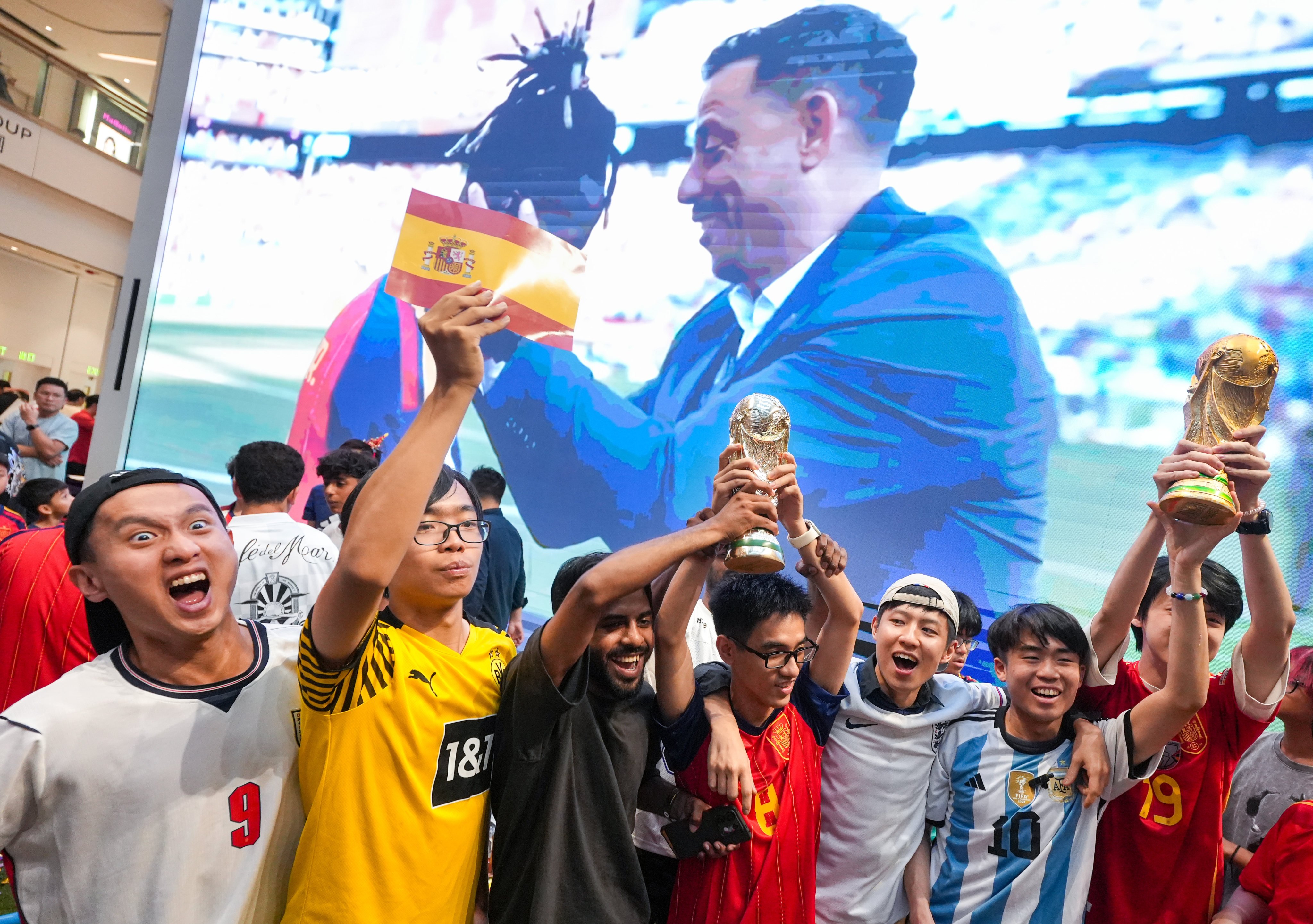 Fans cheer during the World Cup final match between Spain and Argentina at the Olympian City shopping centre in Tai Kok Tsui on July 20. Photo: Sun Yeung