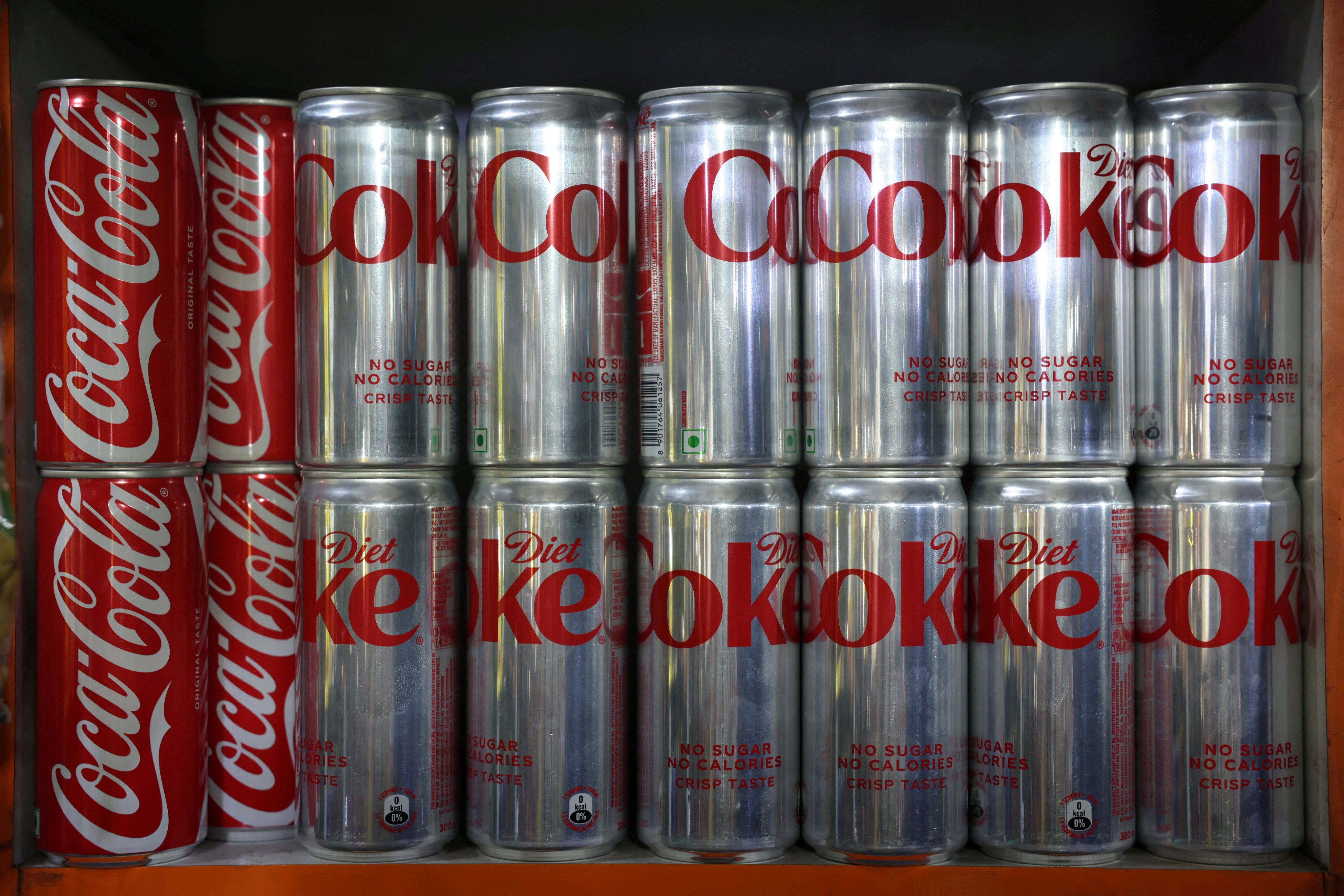 Diet Coke cans are displayed for sale in a shop in New Delhi on April 22. Photo: Reuters