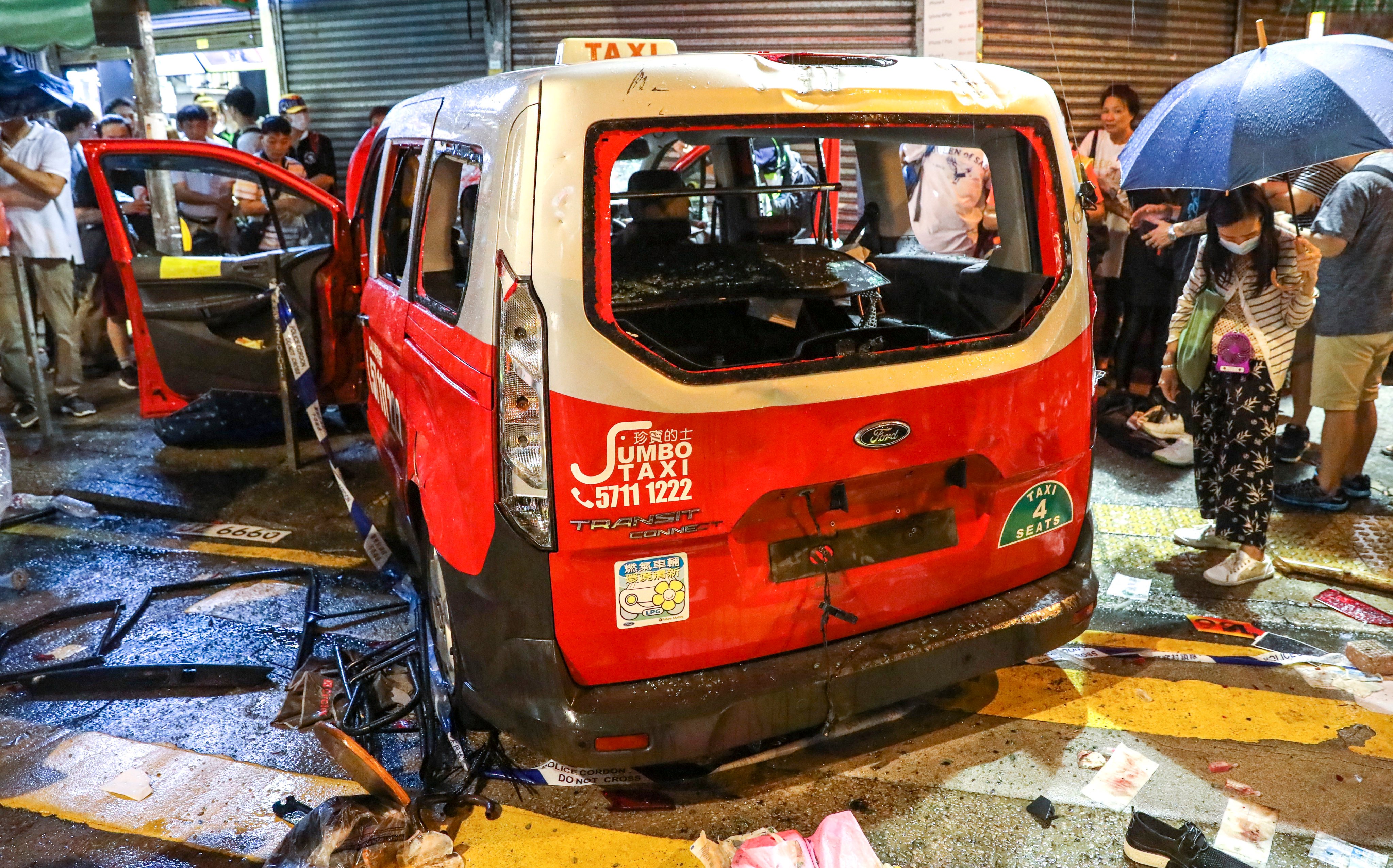 The taxi mounted a pavement and struck Park Hoi-lam during an anti-government protest in Sham Shui Po on October 6, 2019. Photo: K.Y. Cheng