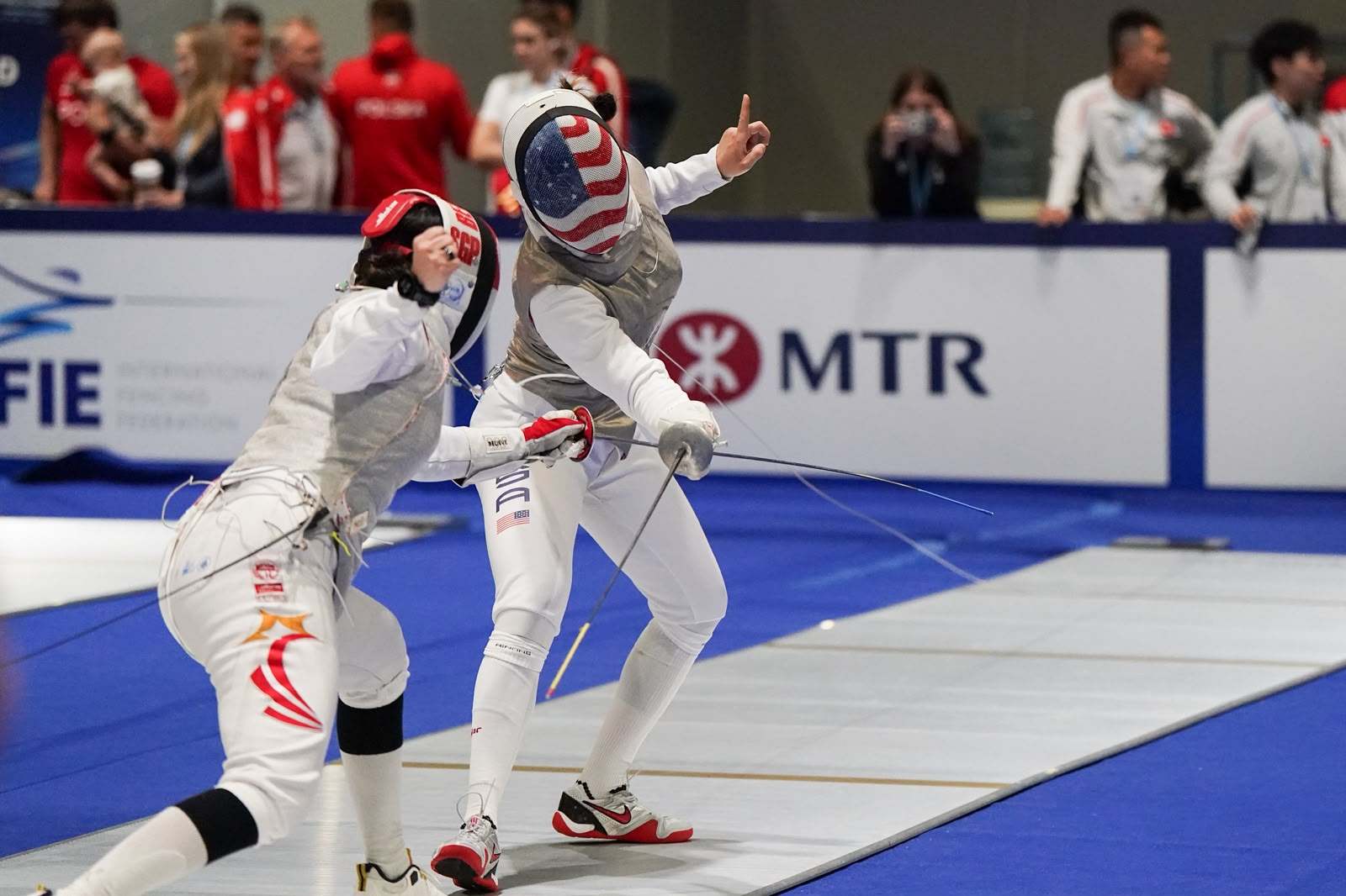 Jaelyn Liu (right) competes against Amita Berthier at the Fencing World Championships at AsiaWorld-Expo. Photo: Mike Chan