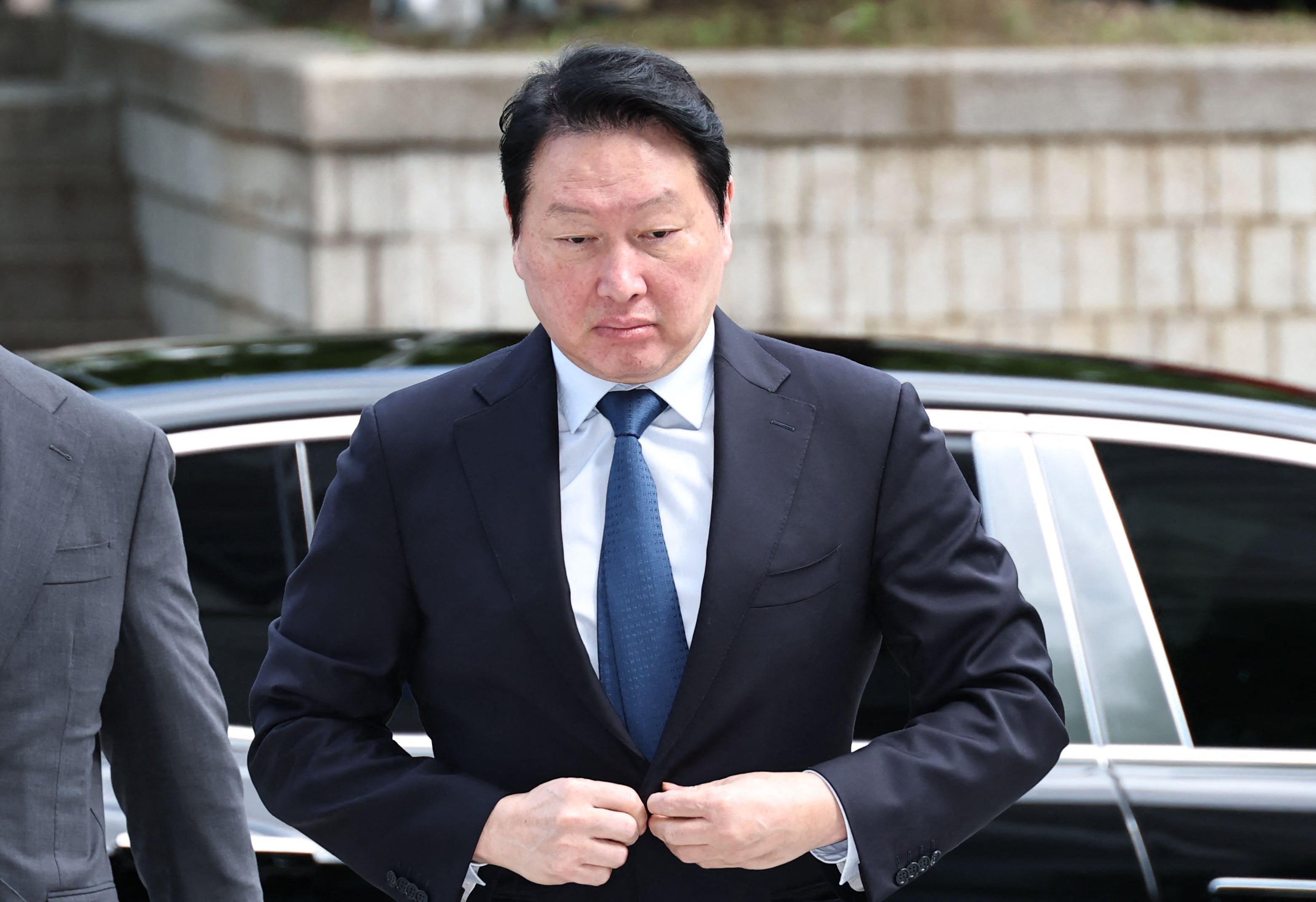 SK Group Chairman Chey Tae-won attends a retrial regarding the division of assets with his former wife, Roh Soh-yeong, on June 26. Photo: Yonhap/AFP