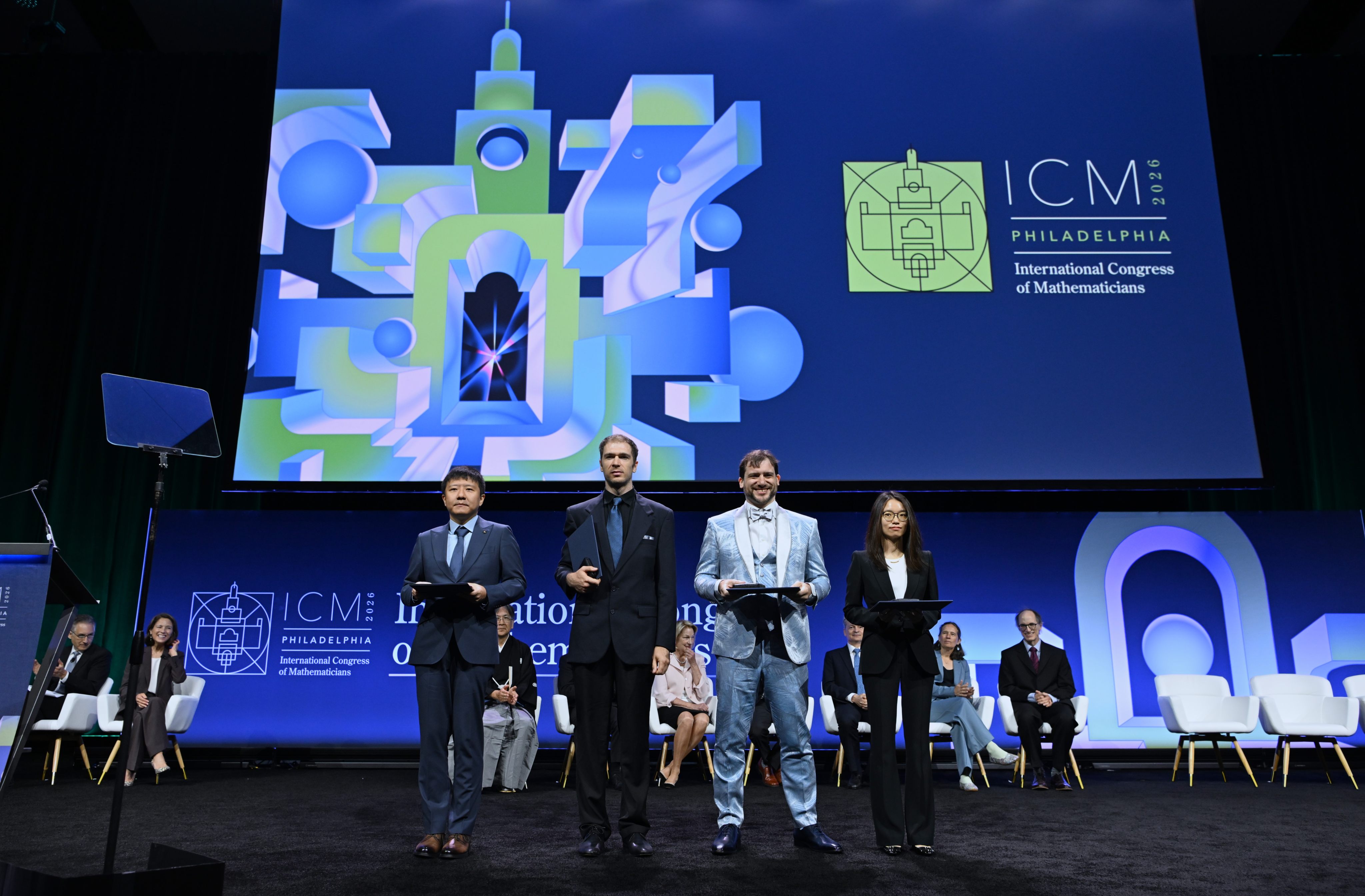 Fields Medallists (from left) Deng Yu, John Pardon, Jacob Tsimerman and Wang Hong pose for a group photograph at the opening ceremony of the International Congress of Mathematicians in Philadelphia on July 23, 2026. Photo: Xinhua