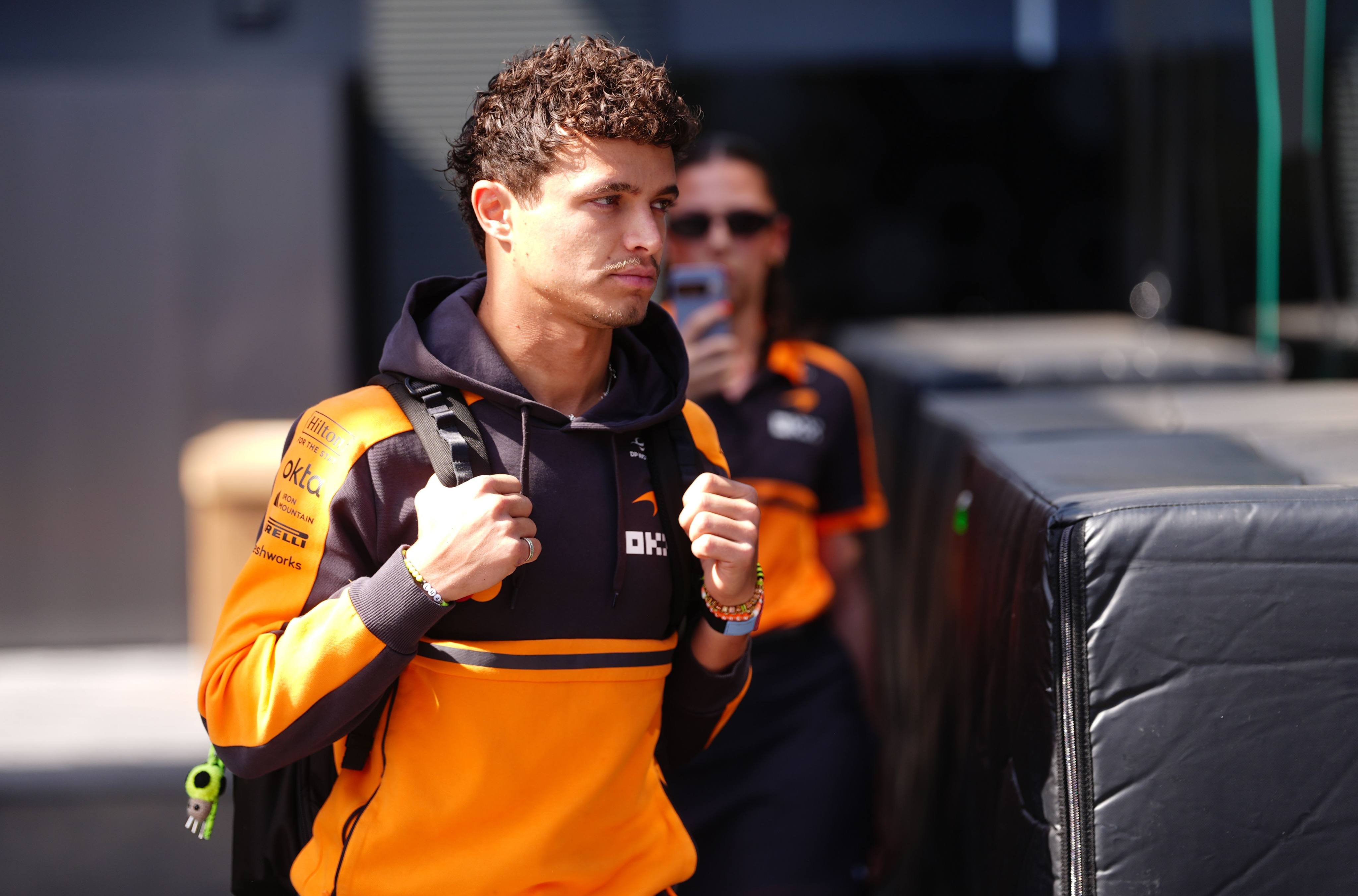 British driver Lando Norris, arriving here for practice at the Hungaroring, says Formula 1 has become too much of a business. Photo: dpa