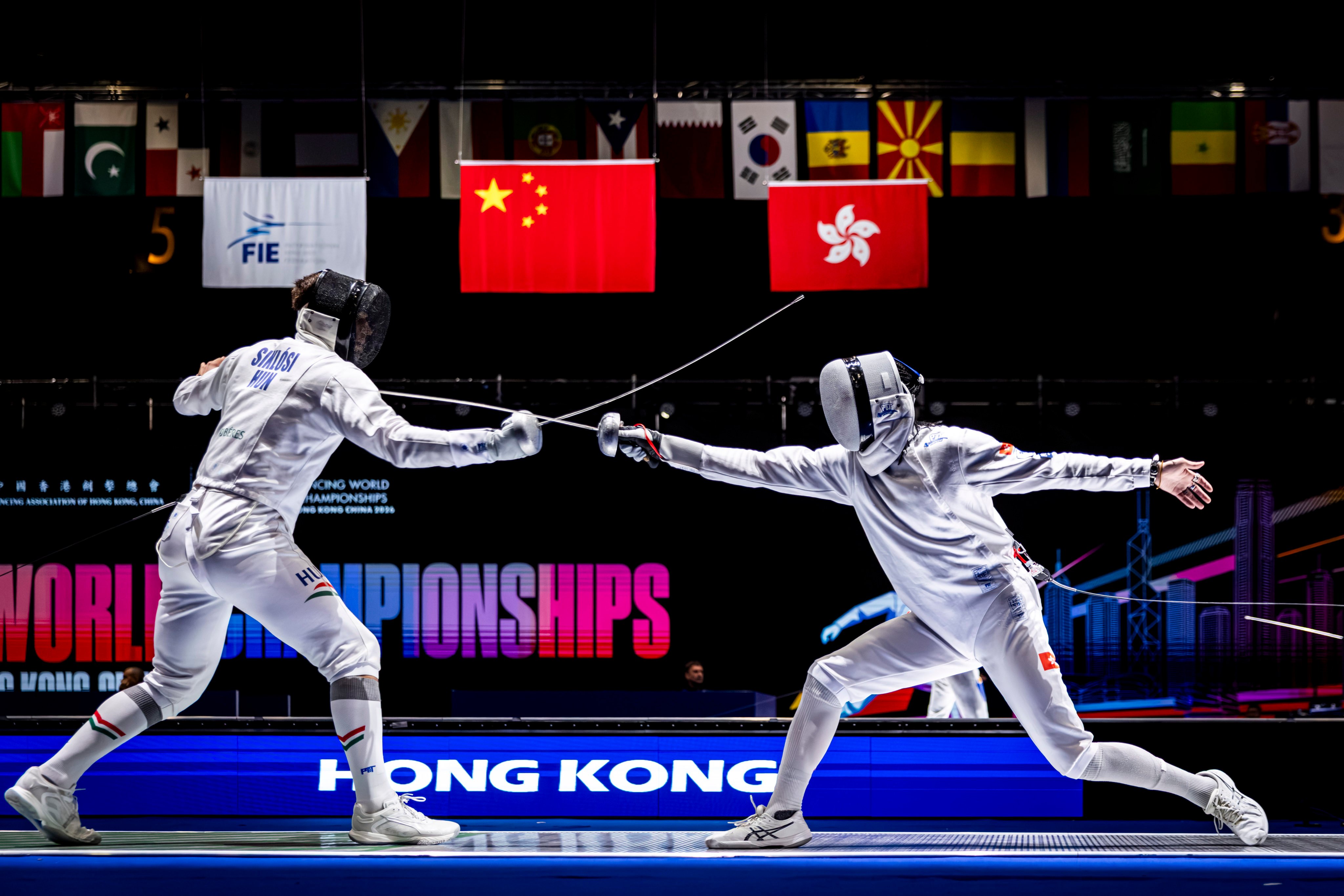 Hong Kong’s Cedric Ho Wai-hang (right) lost to world No 5 Gergely Siklosi of Hungary in the men's épée on Sunday morning. Photo: Fencing Association of Hong Kong, China