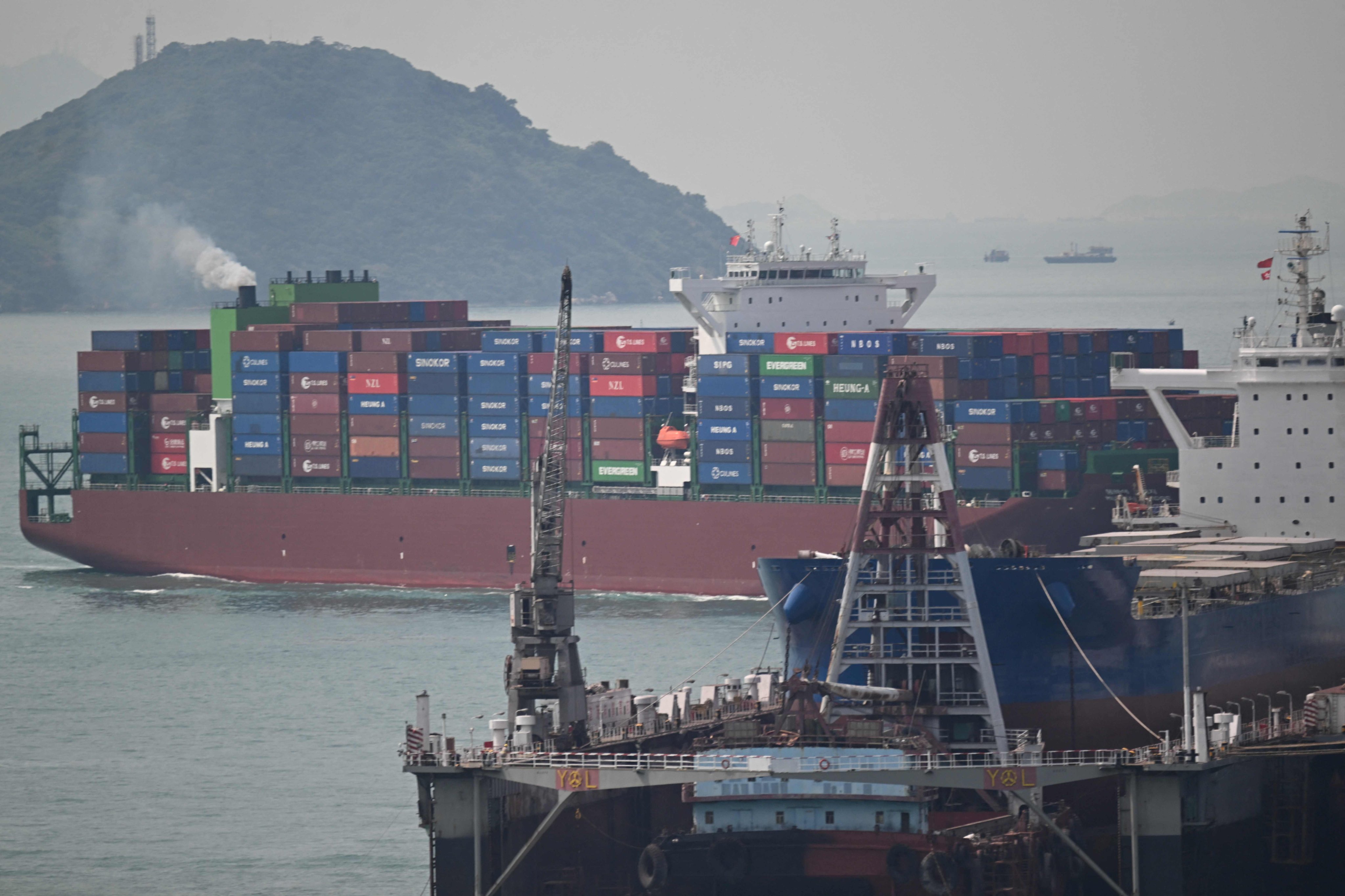 A container ship sails through Hong Kong waters on April 2, 2025. Photo: AFP