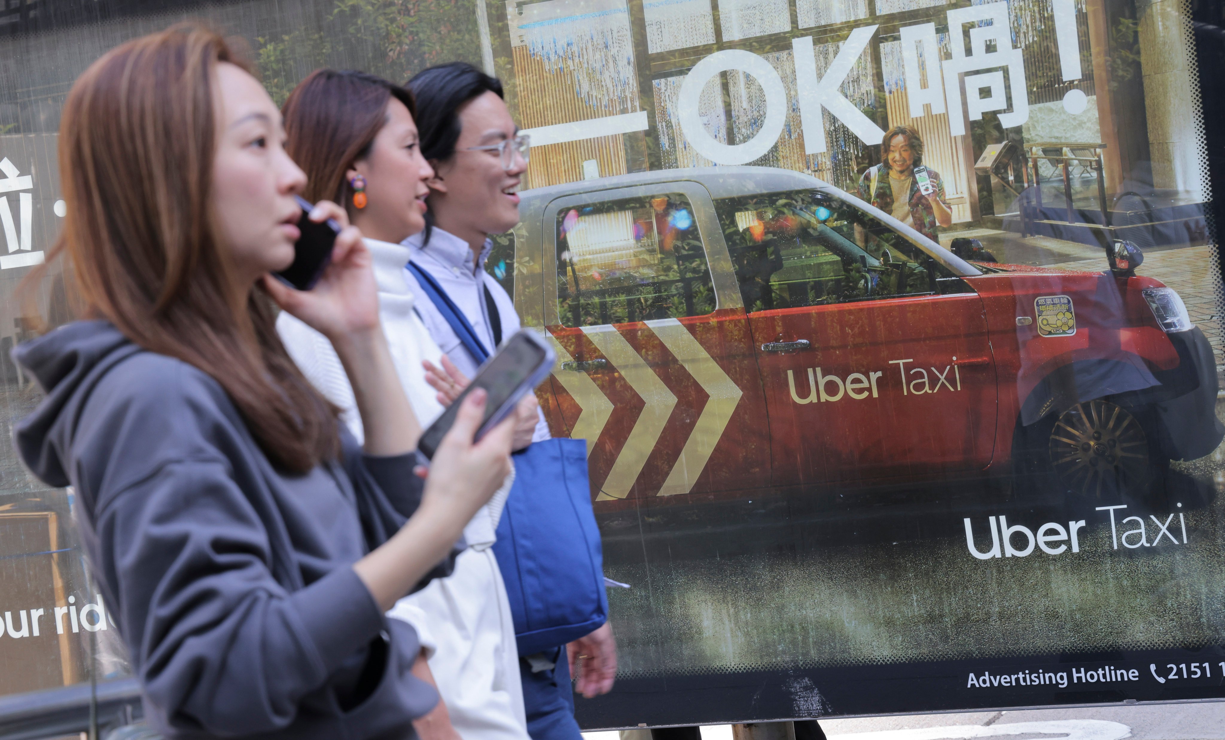 An Uber Taxi advertisement at Nathan Road, Tsim Sha Tsui, on November 21, 2023. Ride-hailing services have captured 22 per cent of Hong Kong’s point-to-point transport market with 114,000 daily trips. Photo: Jelly Tse