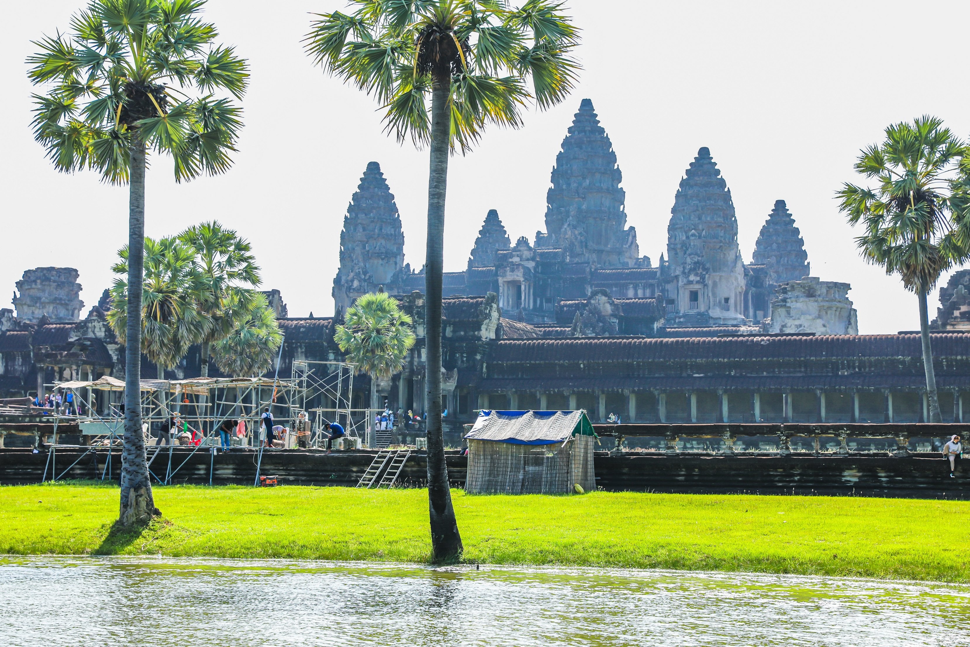 Restoration work is seen on a balustrade at the Angkor Wat temple complex in Siem Reap province, Cambodia, on July 20. Photo: ANA/Xinhua