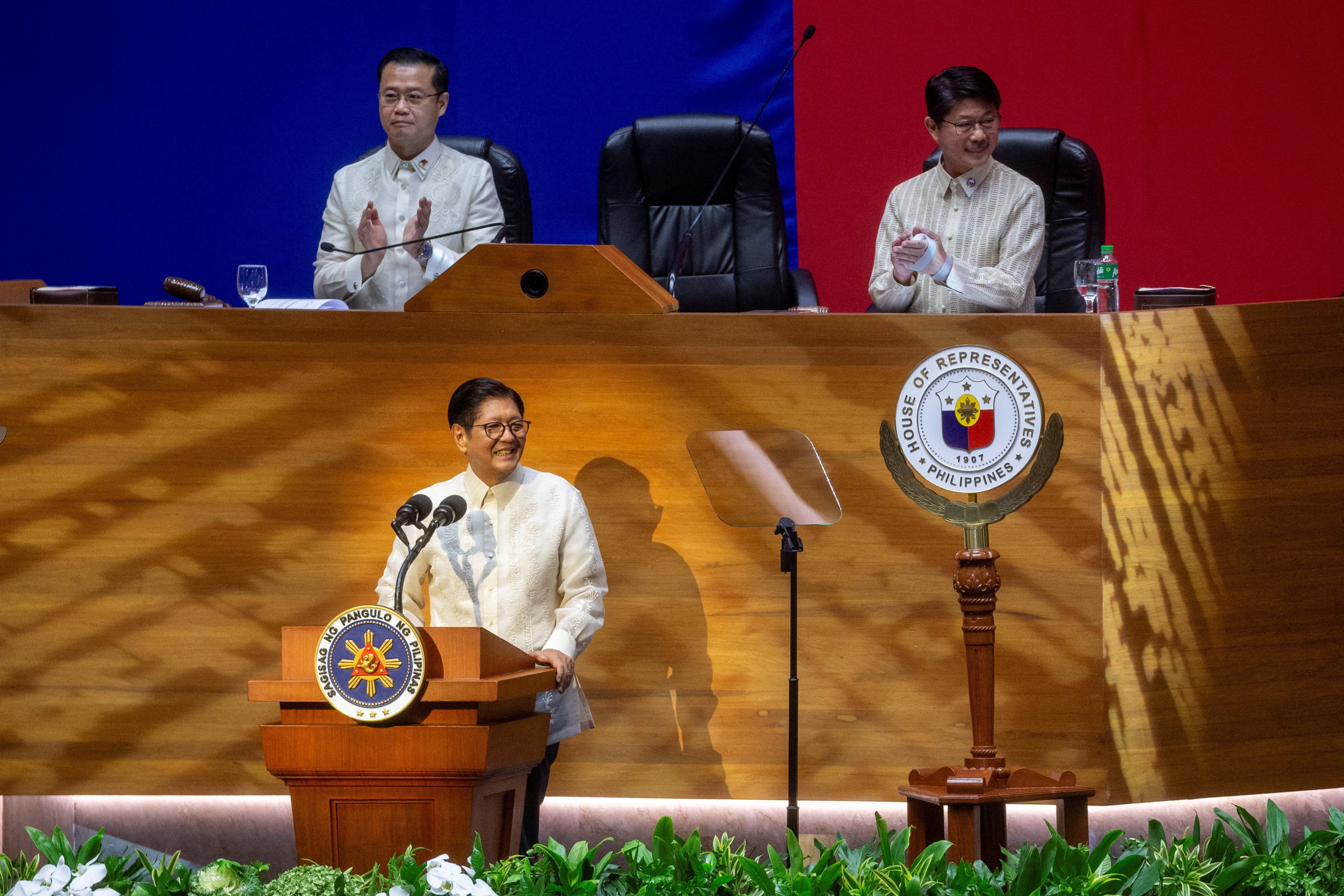 Philippine President Ferdinand Marcos Jnr delivers his fifth State of the Nation Address as Senate leader Sherwin Gatchalian and House Speaker Faustino “Bodjie” Dy clap, at the House of Representatives on Monday. Photo: Reuters