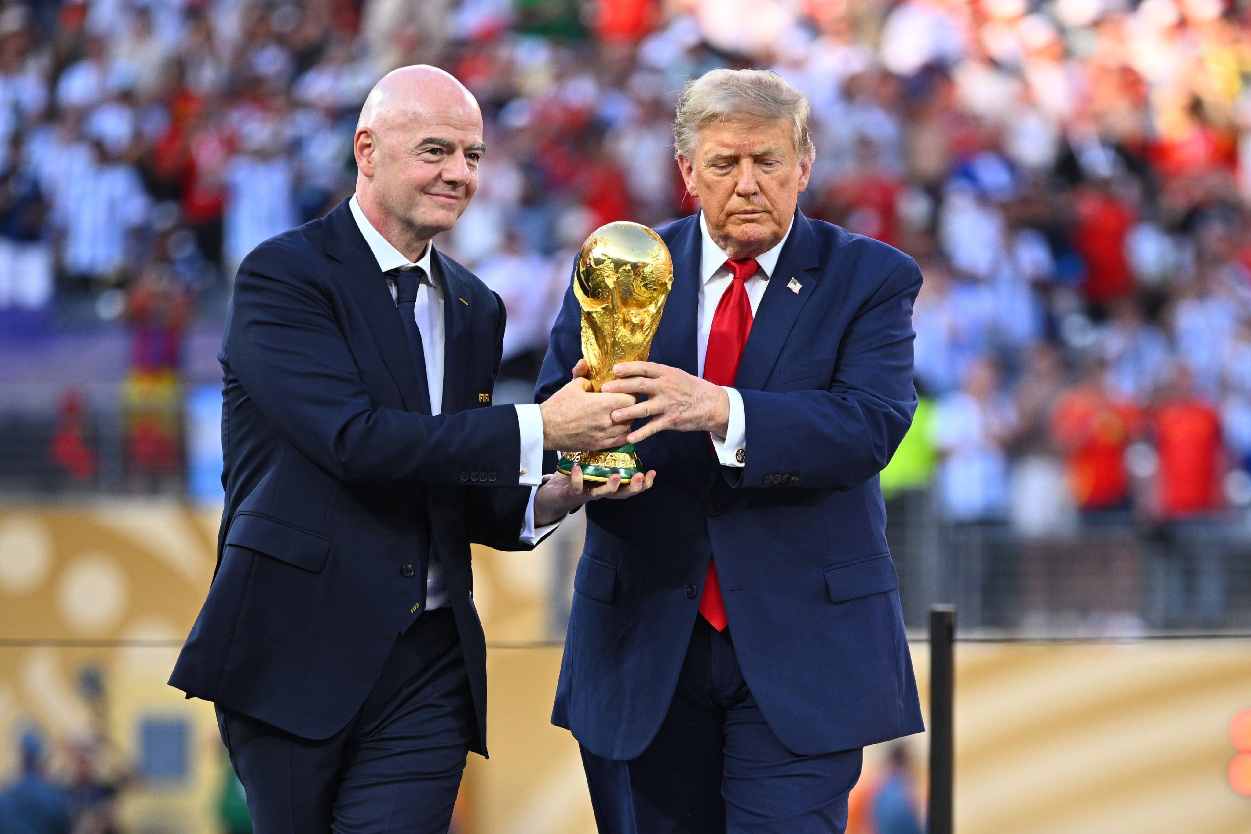 Fifa president Gianni Infantino (left) said detractors had overlooked the joy and togetherness experienced by millions ‌of fans around the world who witnessed the World Cup. Photo: dpa
