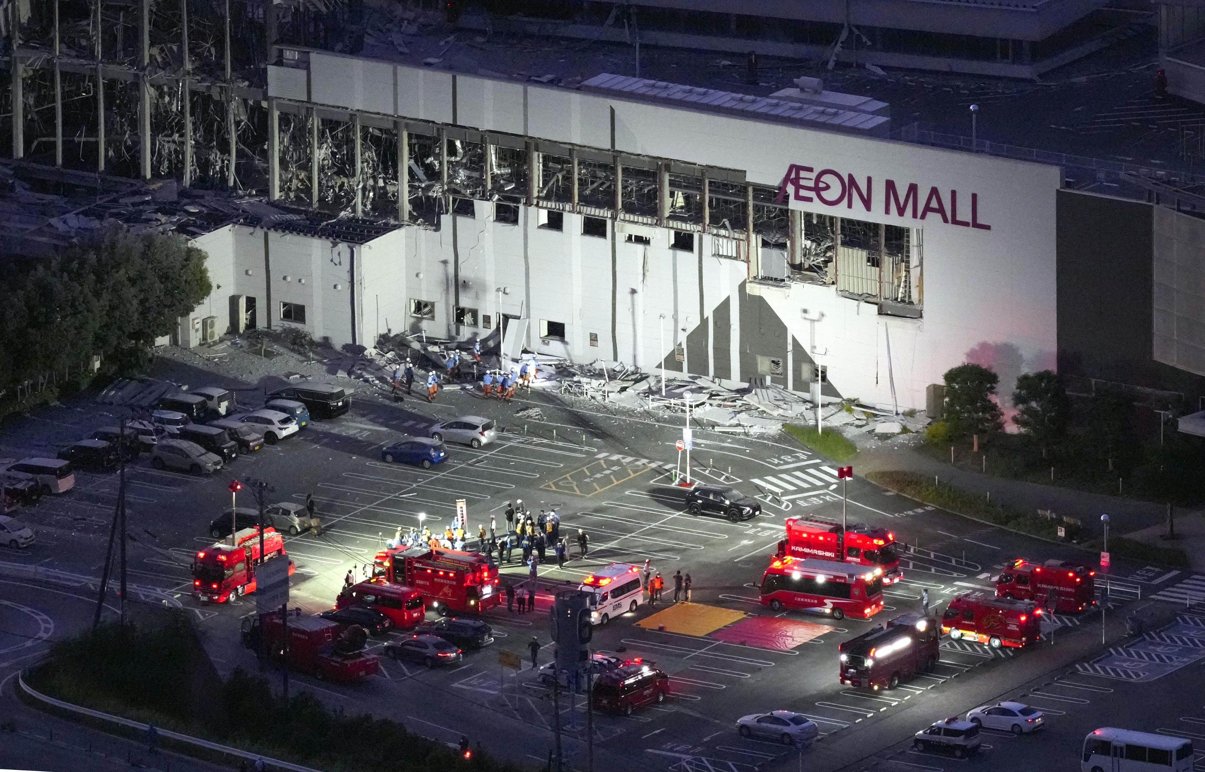 A photo from a Kyodo News helicopter shows an Aeon Mall complex in Kashima, Kumamoto prefecture, whose exterior walls were severely damaged following an explosion after a strong earthquake struck the region on Tuesday. Photo: Kyodo