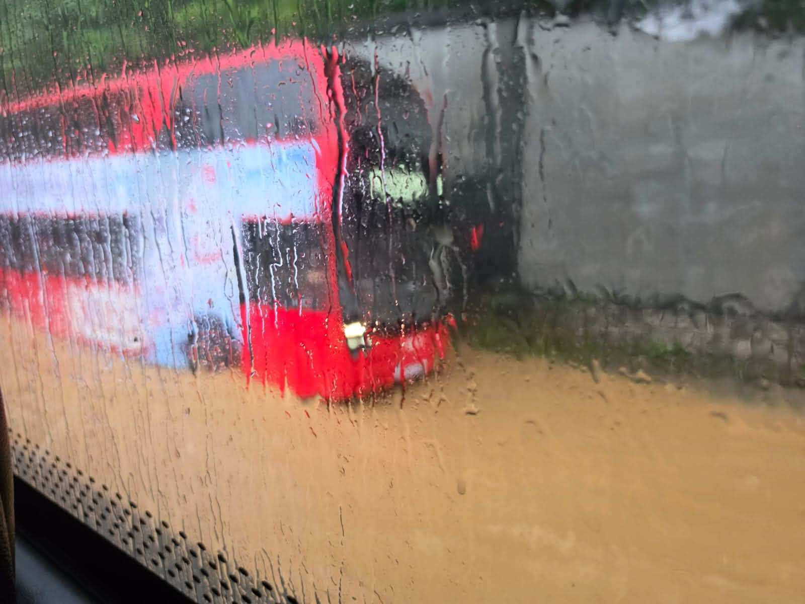A bus caught in flood waters in Tai Po on Tuesday morning. Photo: Handout