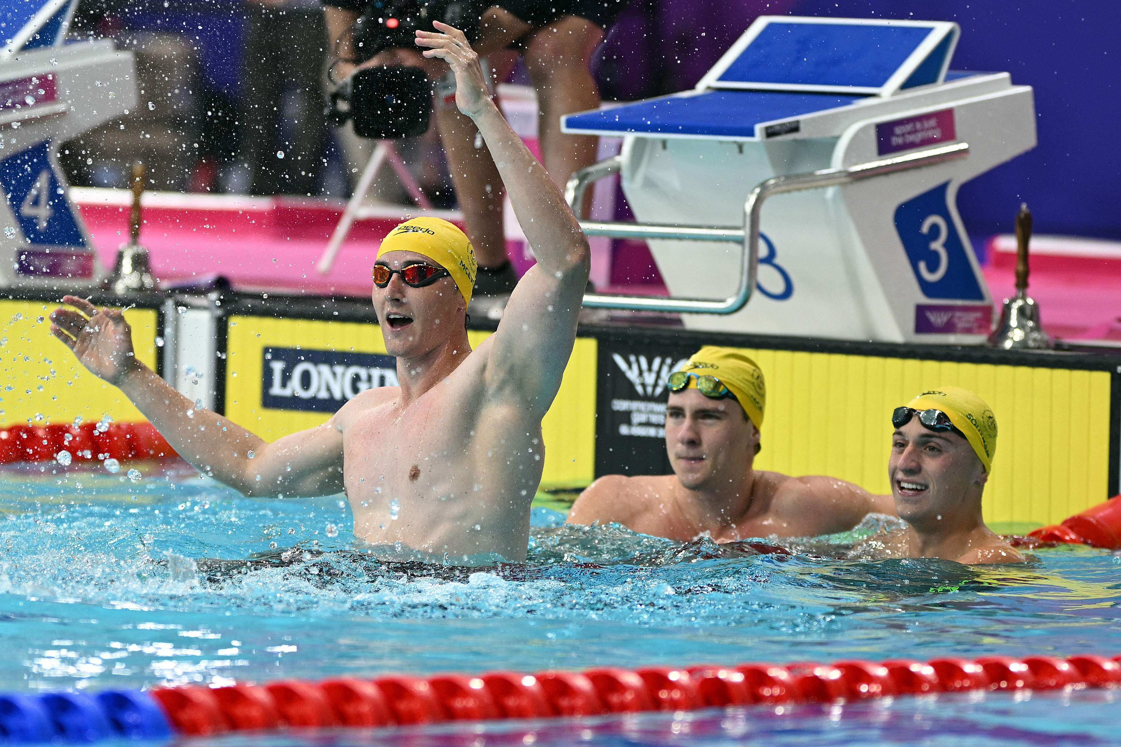 Australia’s Cameron McEvoy (left) after winning the men’s 50m freestyle final at the Commonwealth Games. Photo: AFP