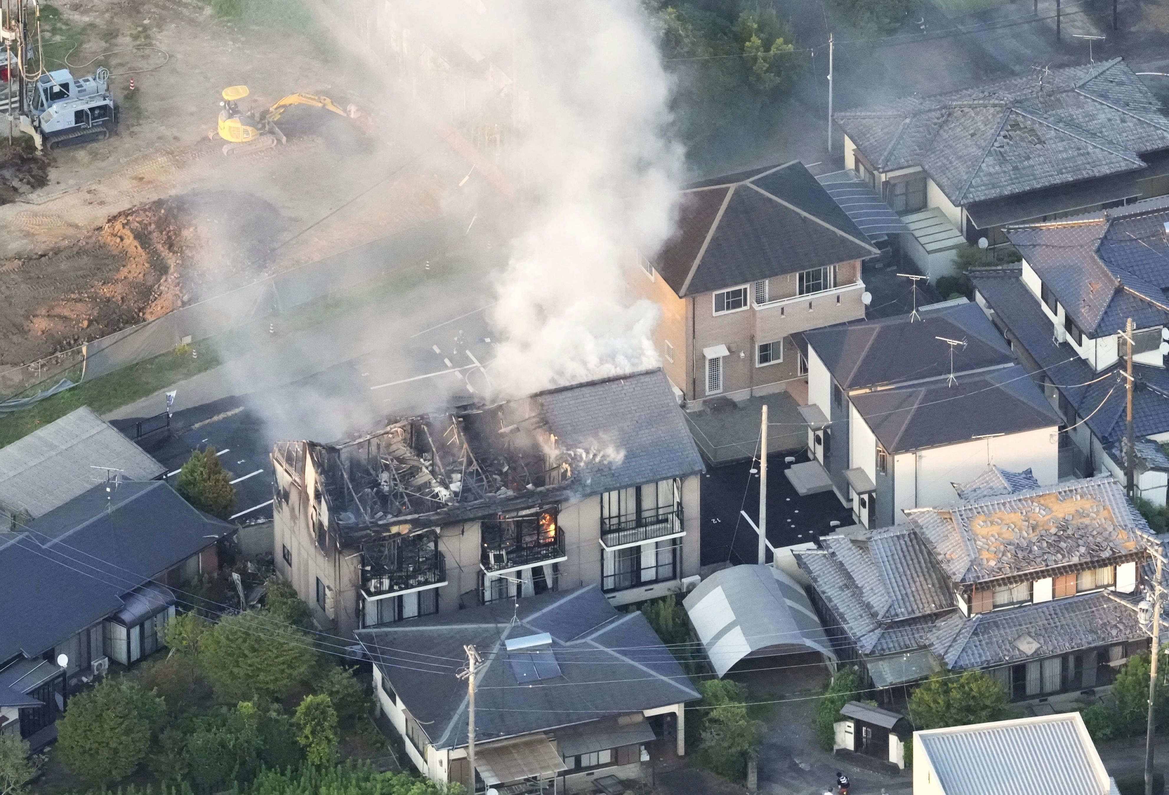 A residential building in Yatsushiro on fire after a 7.1 magnitude earthquake struck Japan’s southern Kumamoto prefecture on Tuesday. Photo: Kyodo via Reuters