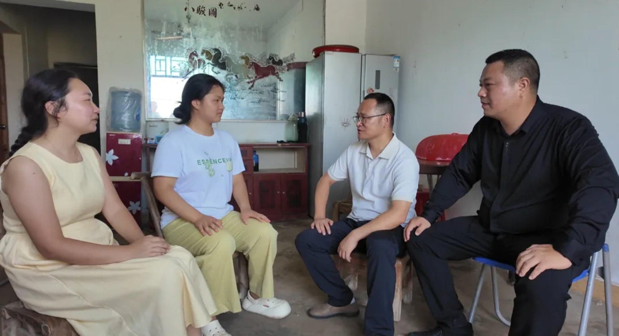 In the photo above, village officials visit Zeng in the wake of her grandmother’s passing. Photo: QQ.com In the photo above, village officials visit Zeng in the wake of her grandmother’s passing. Photo: QQ.com