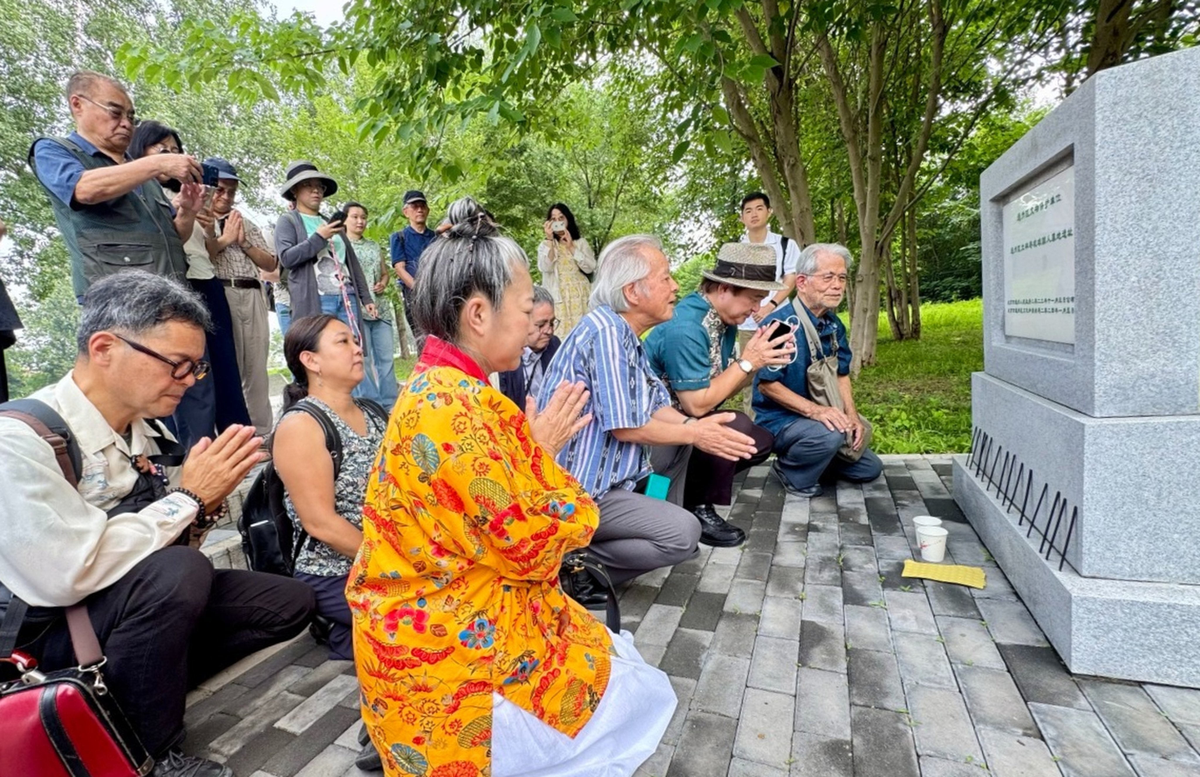 Delegates from Okinawa visit a cemetery in Beijing  that honours six centuries of ties between China and the former island kingdom of Ryukyu. Photo: Global Times