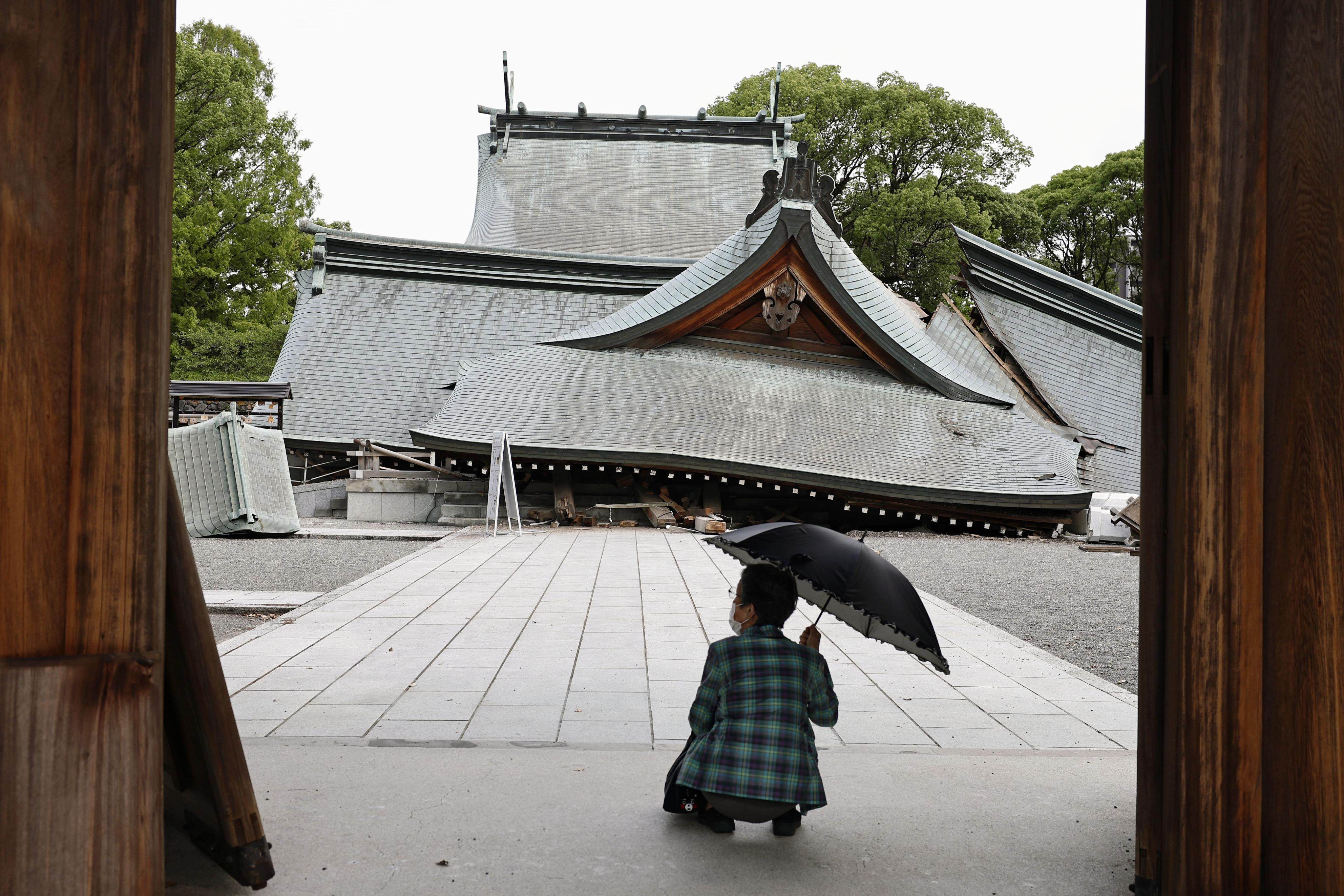Collapsed roofs at the Yatsuhiro Shrine. Photo: Kyodo News via AP